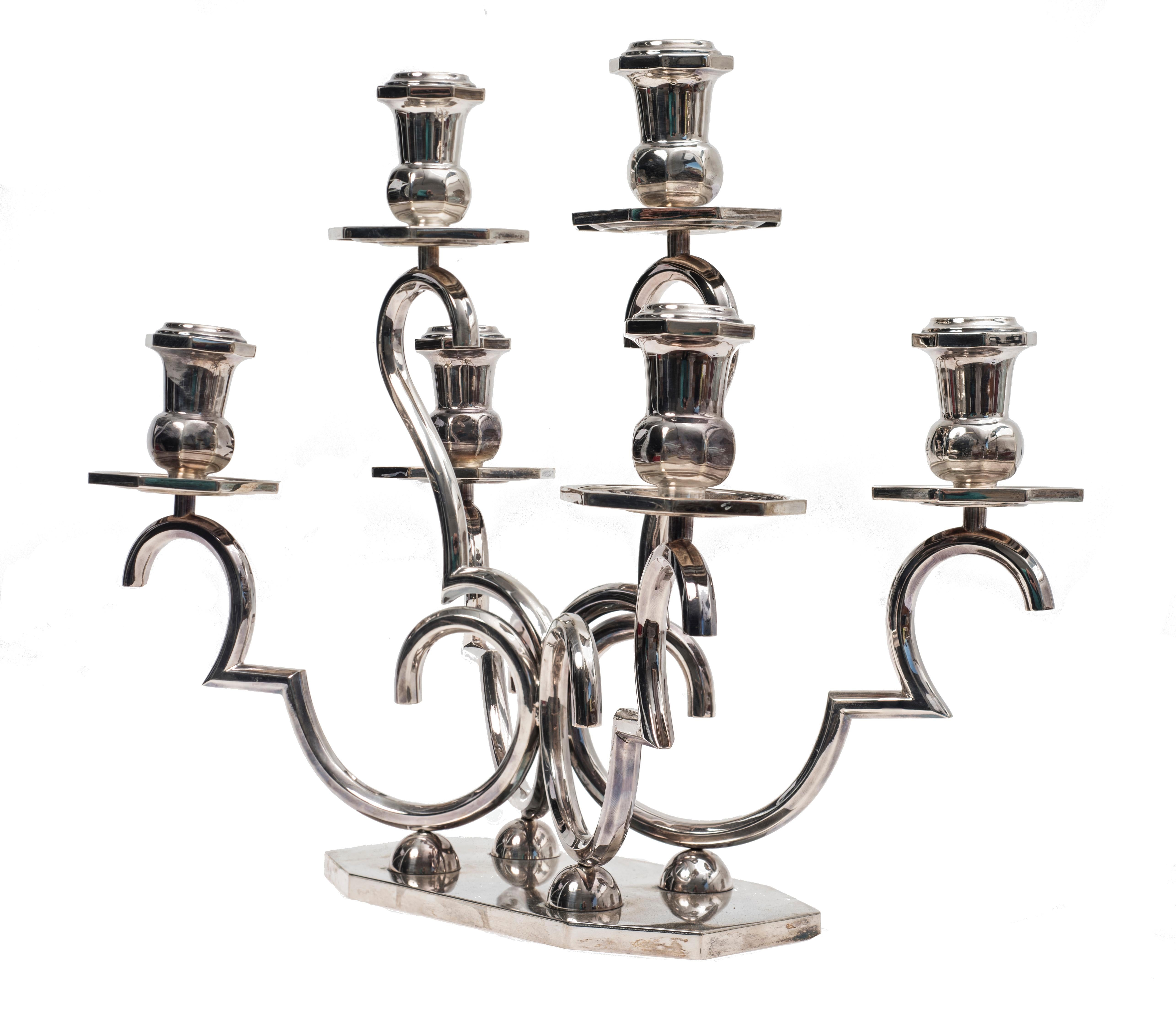 Vintage six arms silver candleholder, 20th century.
Very good conditions.
Weight: Kg 2,480.