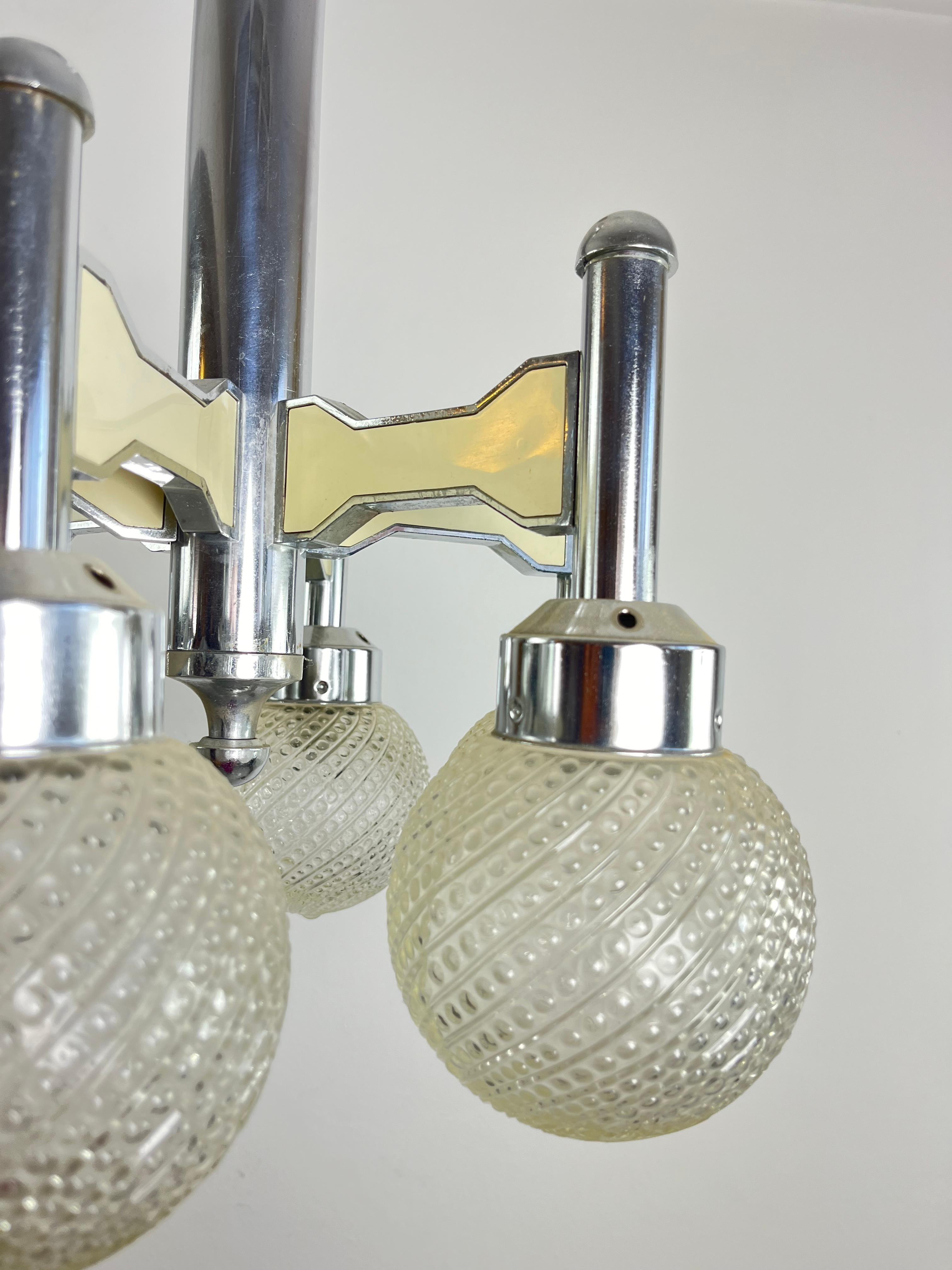 Acier Lustre vintage à six lumières en acier et verre de Murano attribué à L. Frigerio en vente