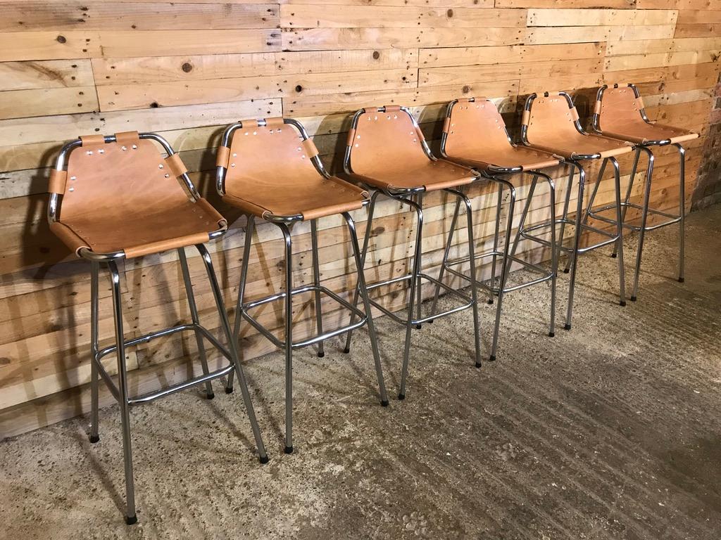 These are the rarest tallest stools by Charlotte Perriand available!

Sought after six leather Charlotte Perriand stools for Les Arcs, 1960.

Six Charlotte Perriand stools from France, stunning stools very unusual and sought after, designed by
