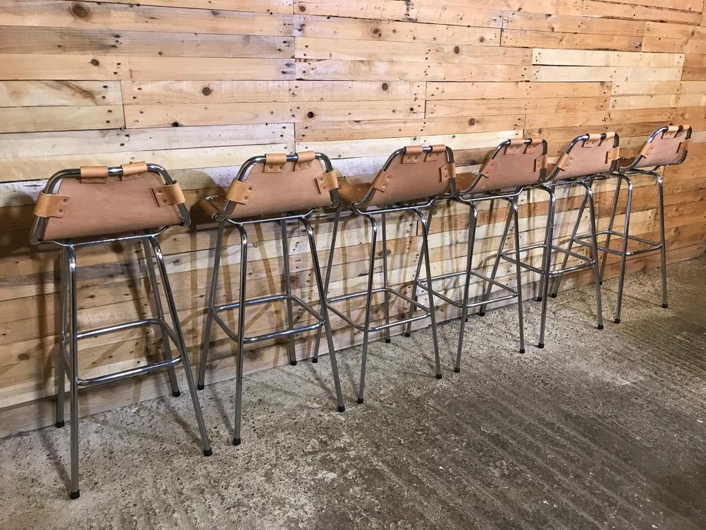 Vintage cognac colour Leather Stools Selected by Charlotte Perriand for Les Arcs 1