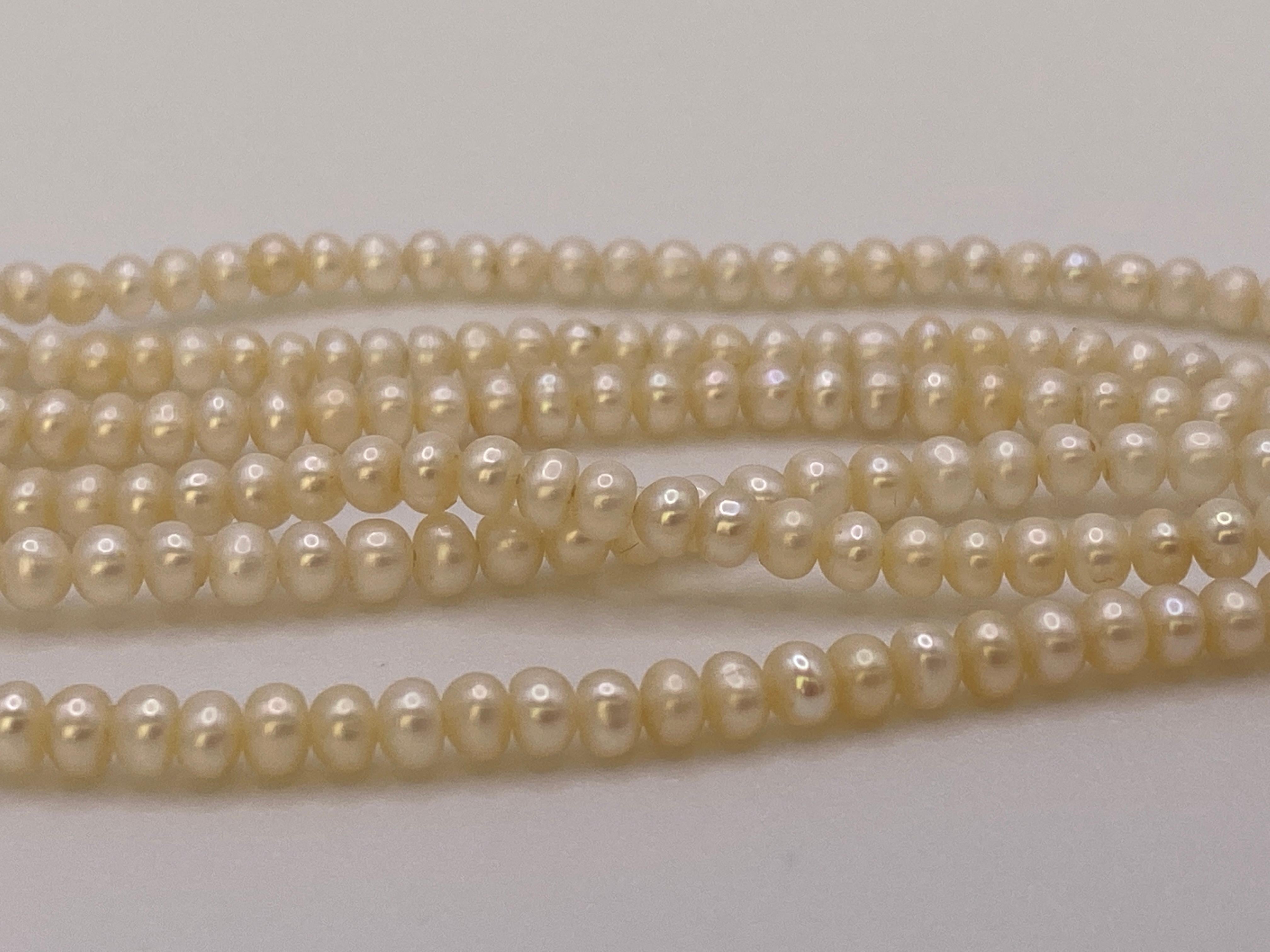 Vintage Six-Strand Fresh Water Button Pearl Choker Necklace with gold clasp. For Sale 4