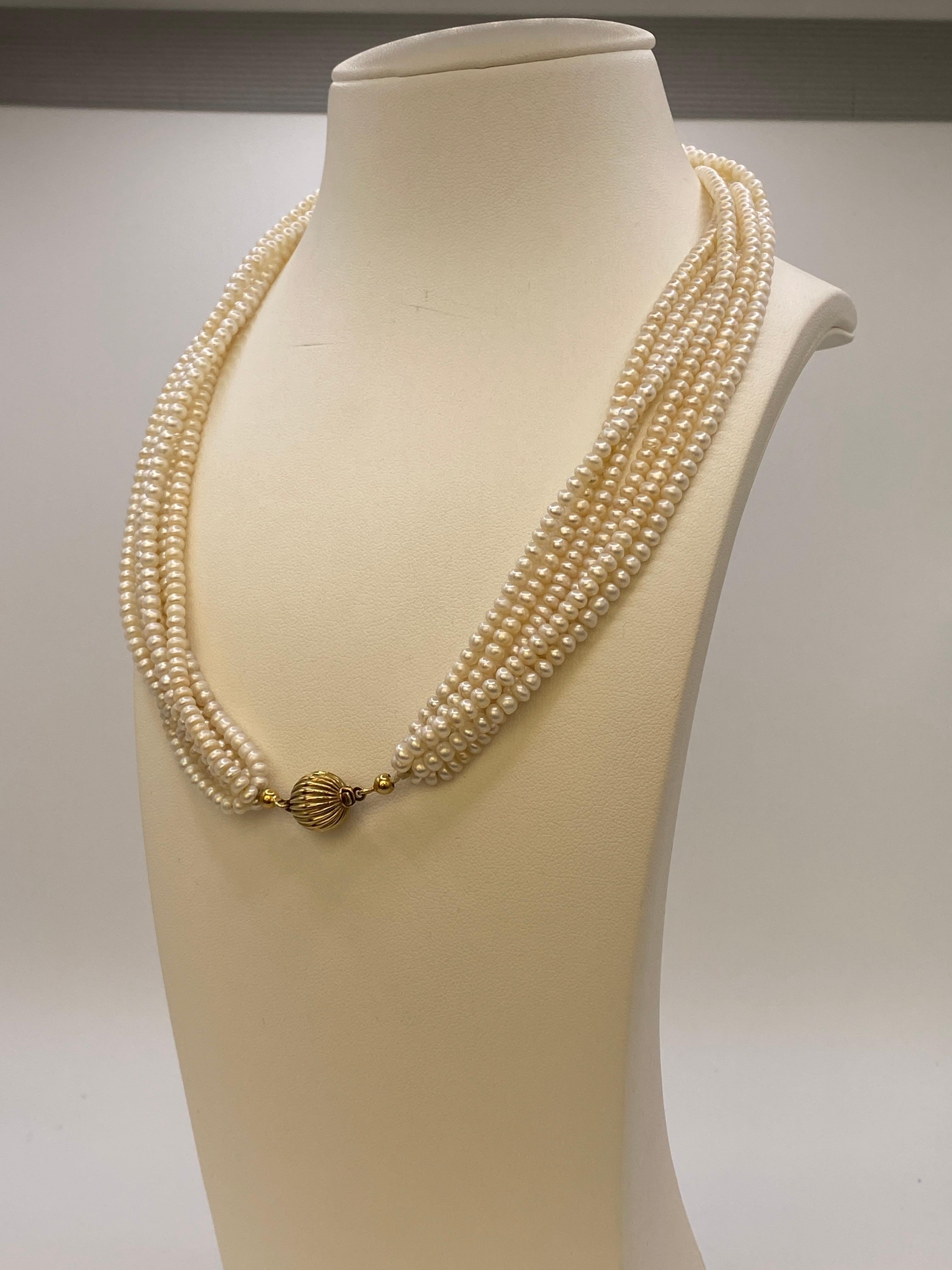 Uncut Vintage Six-Strand Fresh Water Button Pearl Choker Necklace with gold clasp. For Sale