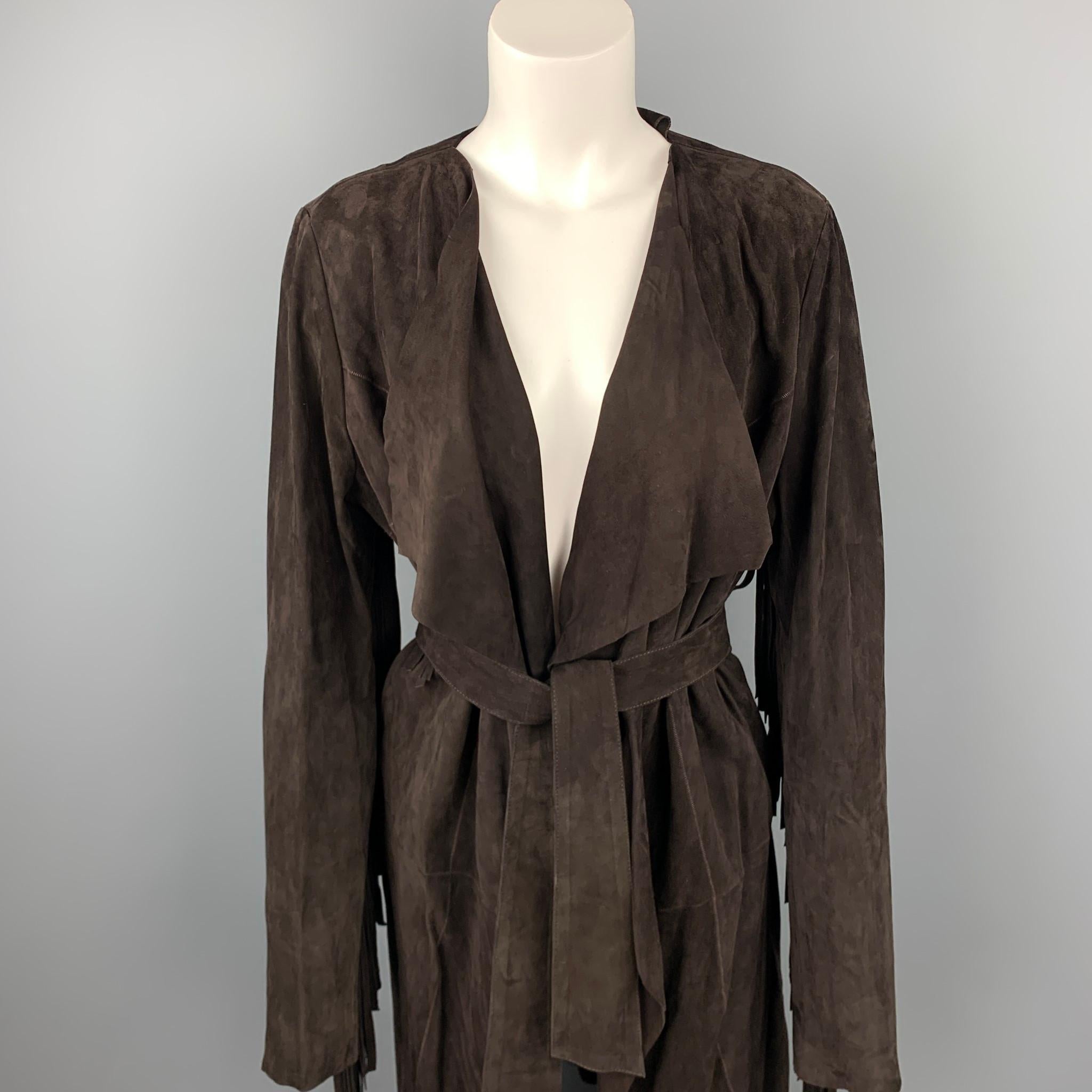 VINTAGE coat comes in a brown suede with a fringe trim featuring a open front and a belted style.

Good Pre-Owned Condition.
Marked: No tag 

Measurements:

Shoulder: 16 in. 
Bust: 40 in. 
Sleeve: 28 in. 
Length: 38.5 in. 