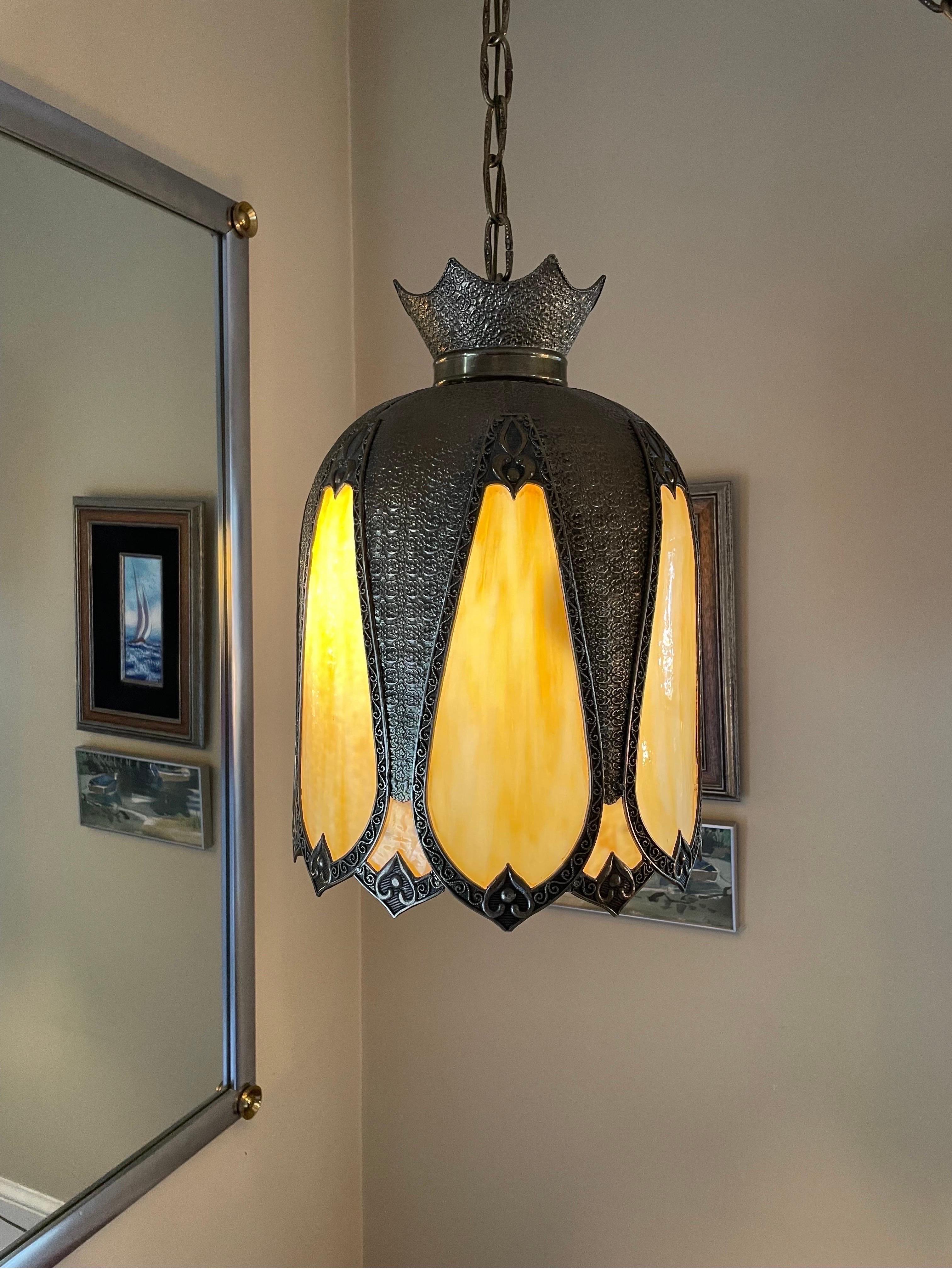 Slag glass and bronze swag pendant. Great proportion and balance. Nicely patinated. 3 Bulb function on individual pull chains for controlled ambiance and color control of slag panes. 11' Chain for versatile placement. Lamp Fashion MFG. Co.