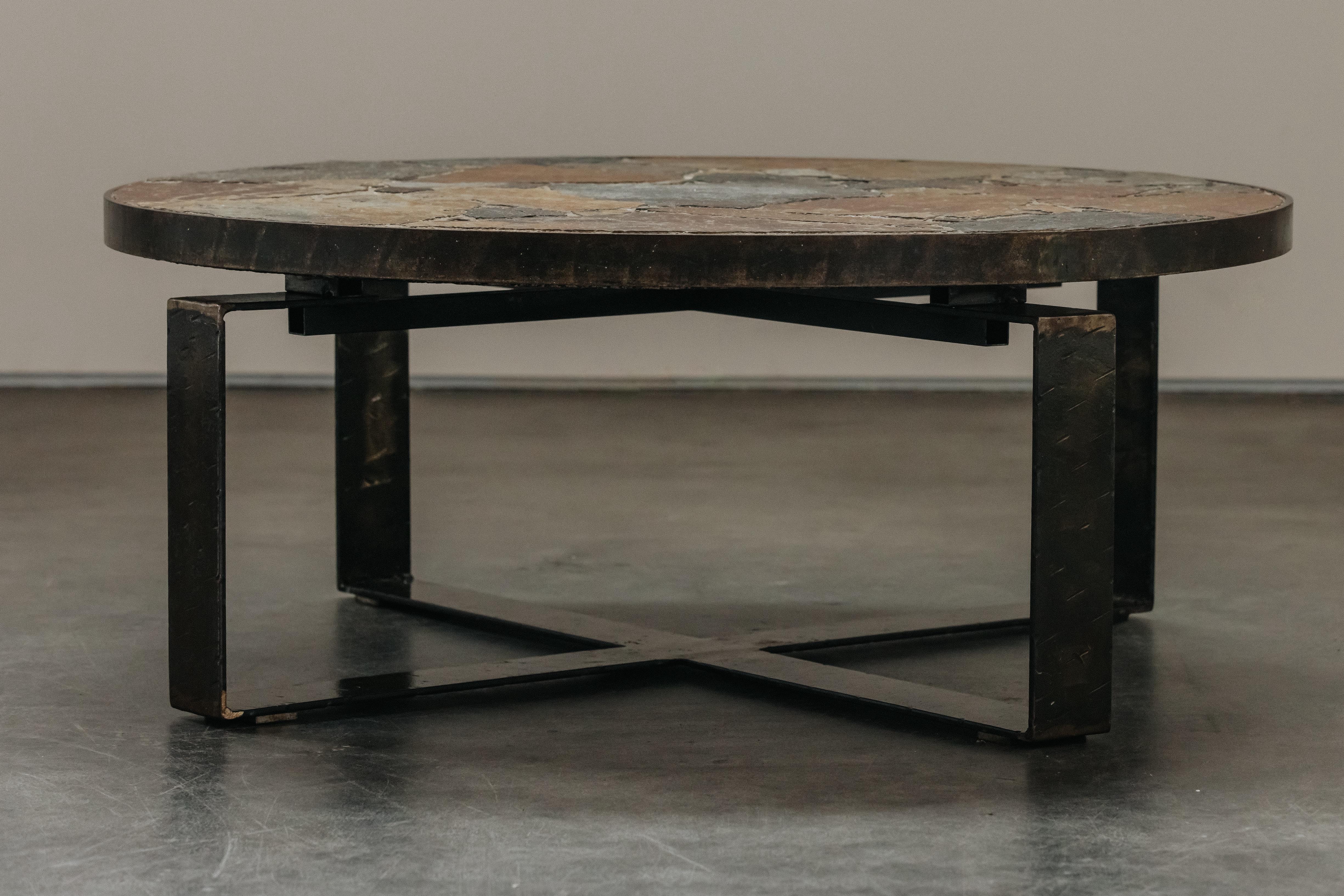 Vintage Slate Coffee Table From France, Circa 1960.  Mosaic colored slate stone  with a steel edge.  Resting on a steel base.  Great condition.