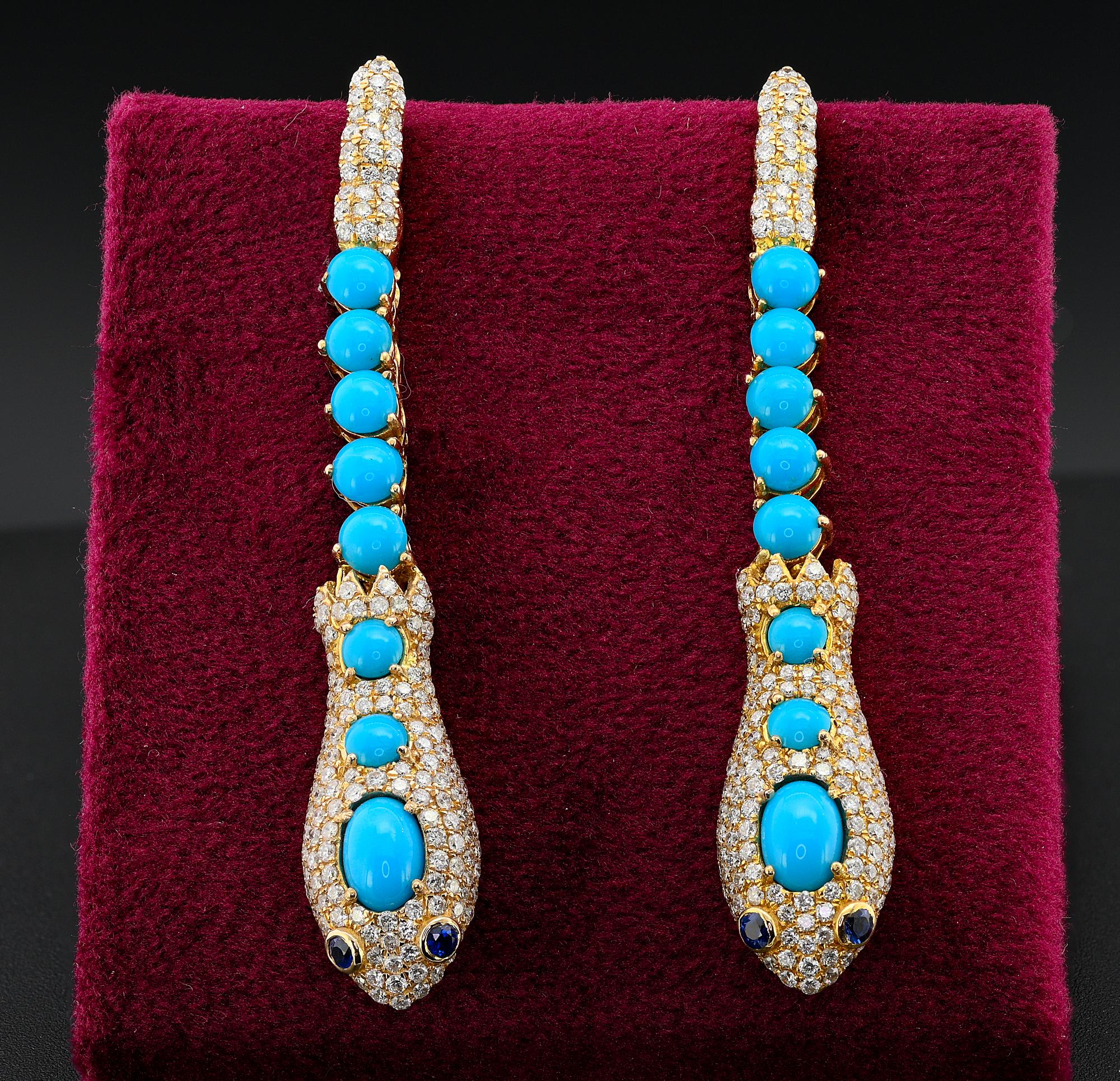 These very different and quite unique earrings are mid century circa
Sensual snake design hand crafted of solid 18 KT gold
They are made in a combination of natural Turquoise, the best Sleeping beauty variety, beautiful color, complemented by 4.70