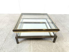 Vintage sliding glass coffee table by Maison Jansen, 1970s