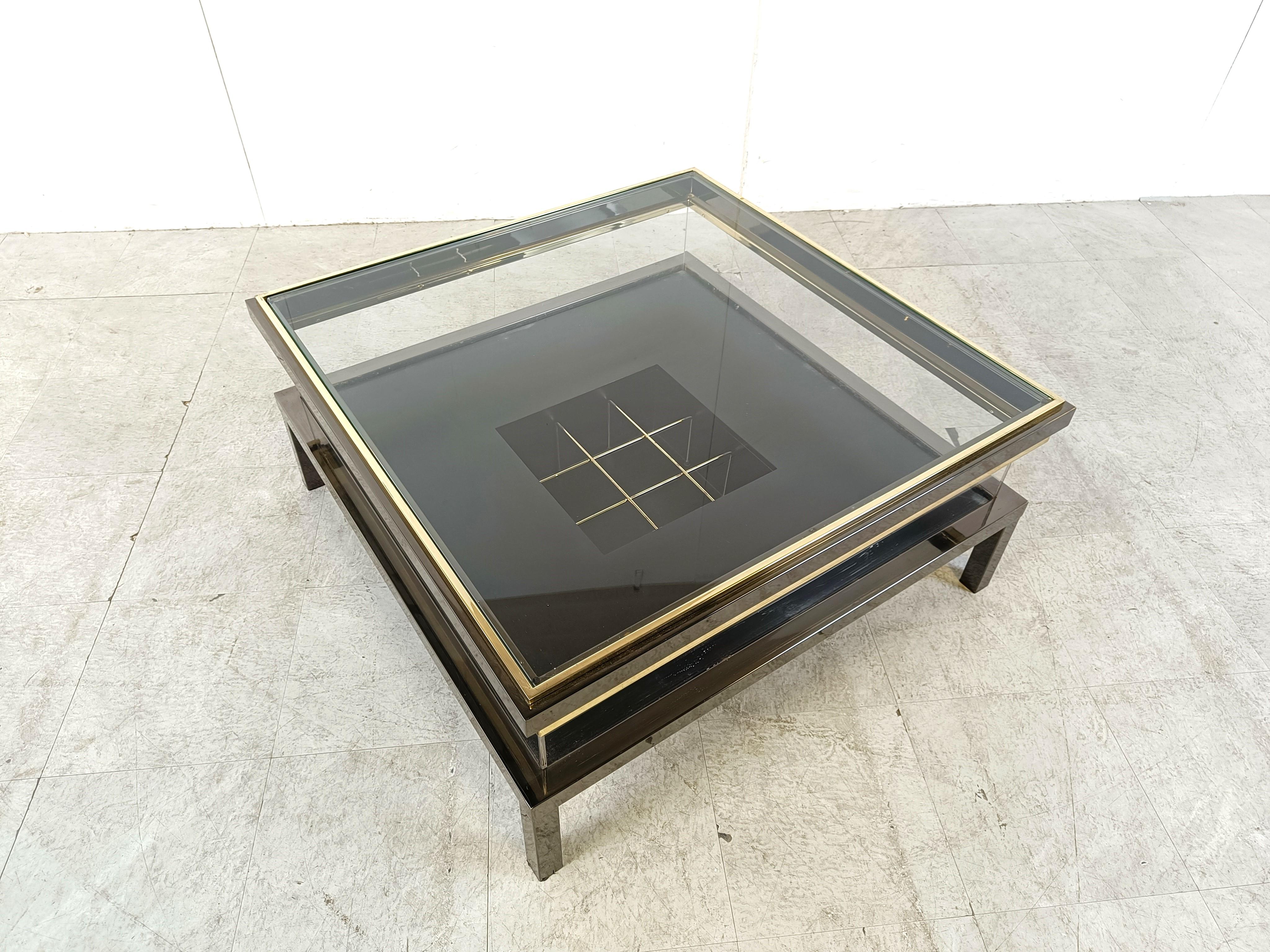 Vintage sliding glass coffee table by Maison Jansen, 1970s In Good Condition For Sale In HEVERLEE, BE