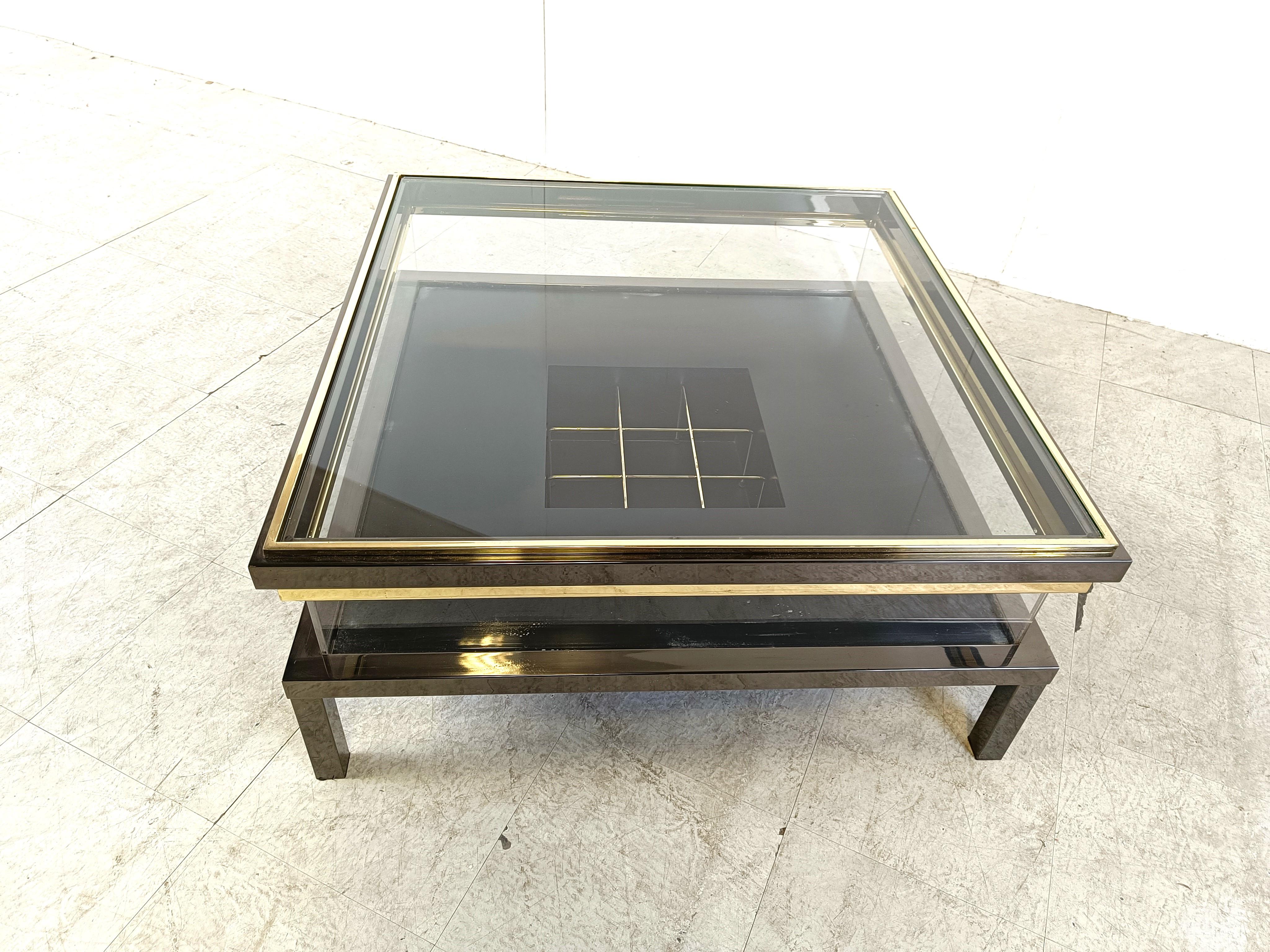Late 20th Century Vintage sliding glass coffee table by Maison Jansen, 1970s For Sale