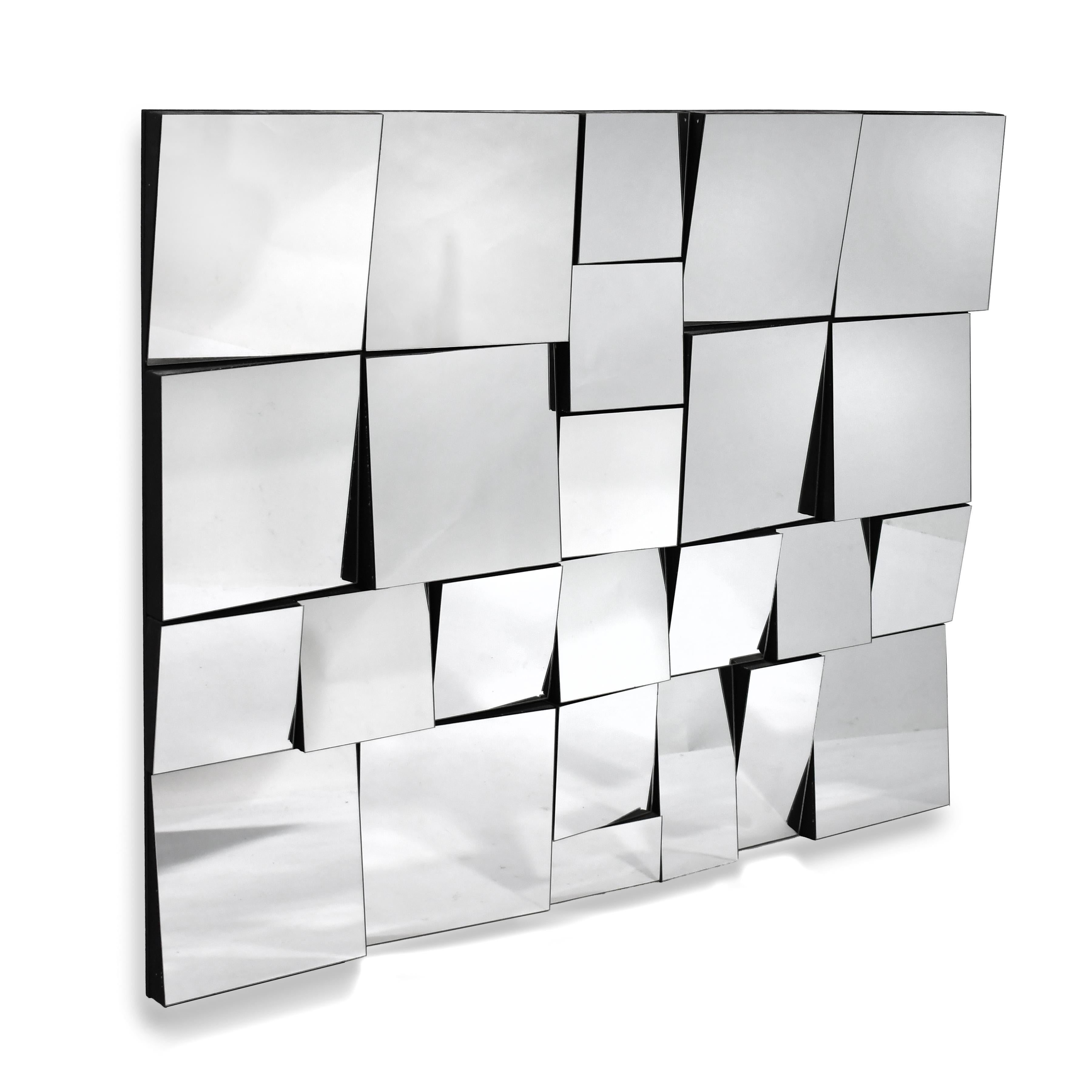 A wonderful vintage example, this arresting wall mirror/ sculpture engages the viewer and activates any wall with its fractured views.

This piece is similar to Neal Small's designs from the same period. Marshall Gross, a graduate of the