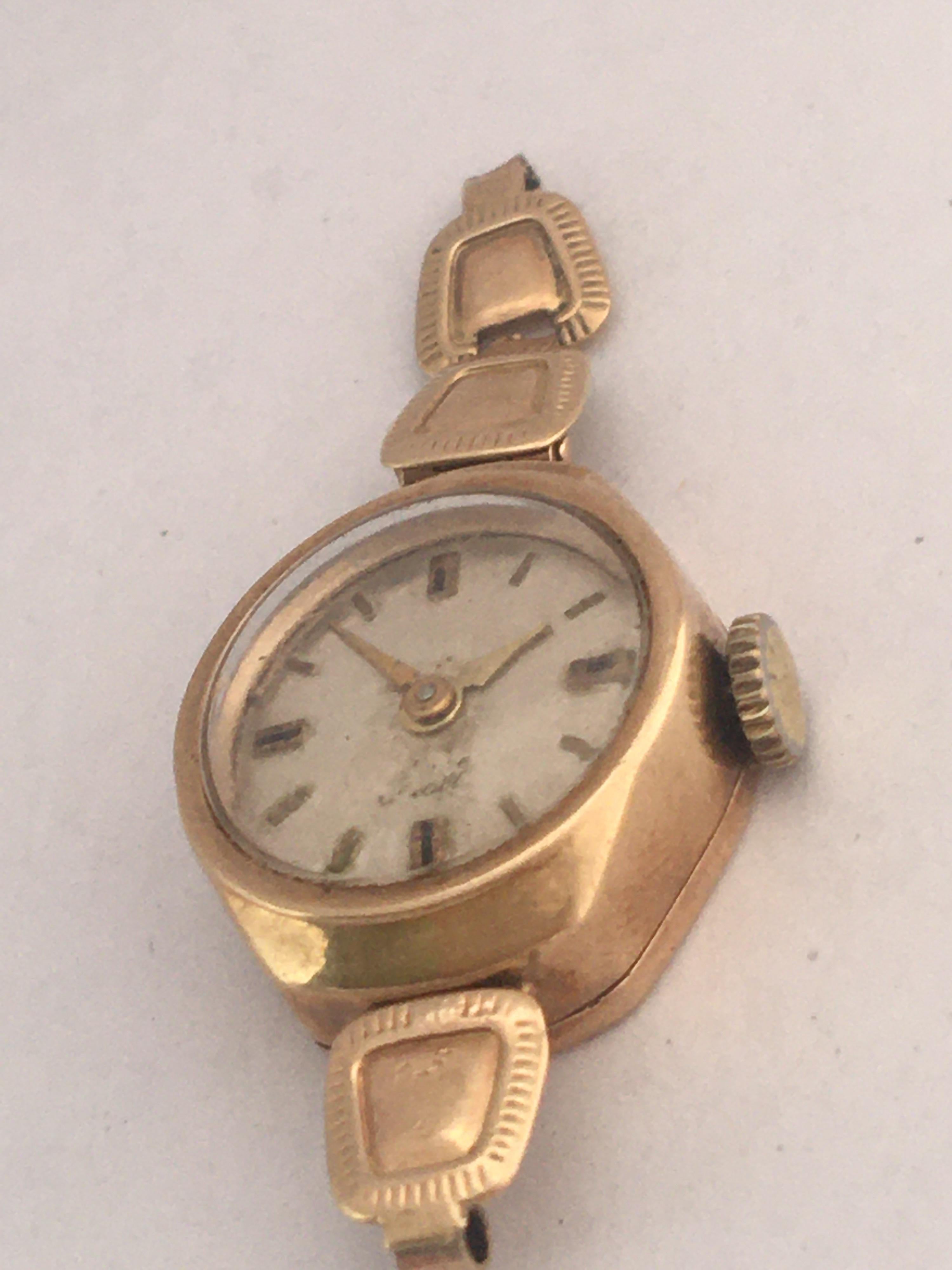 small vintage gold watch