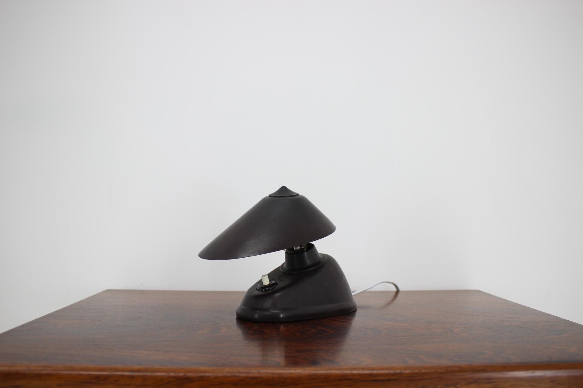 - Made in Czechoslovakia
- Made of bakelite
- Adjustable lamp shade
- Re-polished
- Fully functional
- Good, original condition.