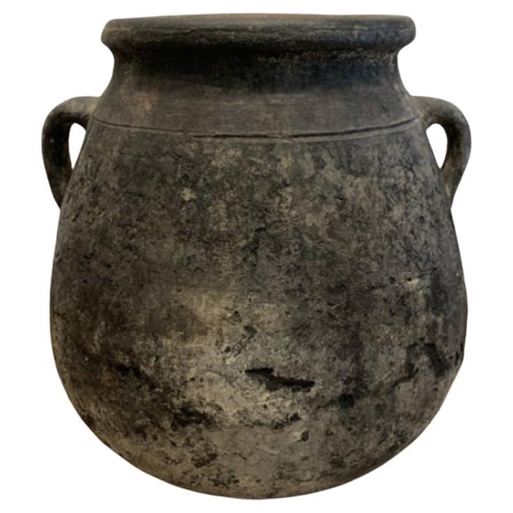 Vintage Small Black Olive Pot - 19th Century 


Discover the timeless charm of our Vintage Small Black Olive Pot, a testament to the beauty of rustic elegance. Crafted with meticulous attention to detail, this matte olive pottery decorative pot