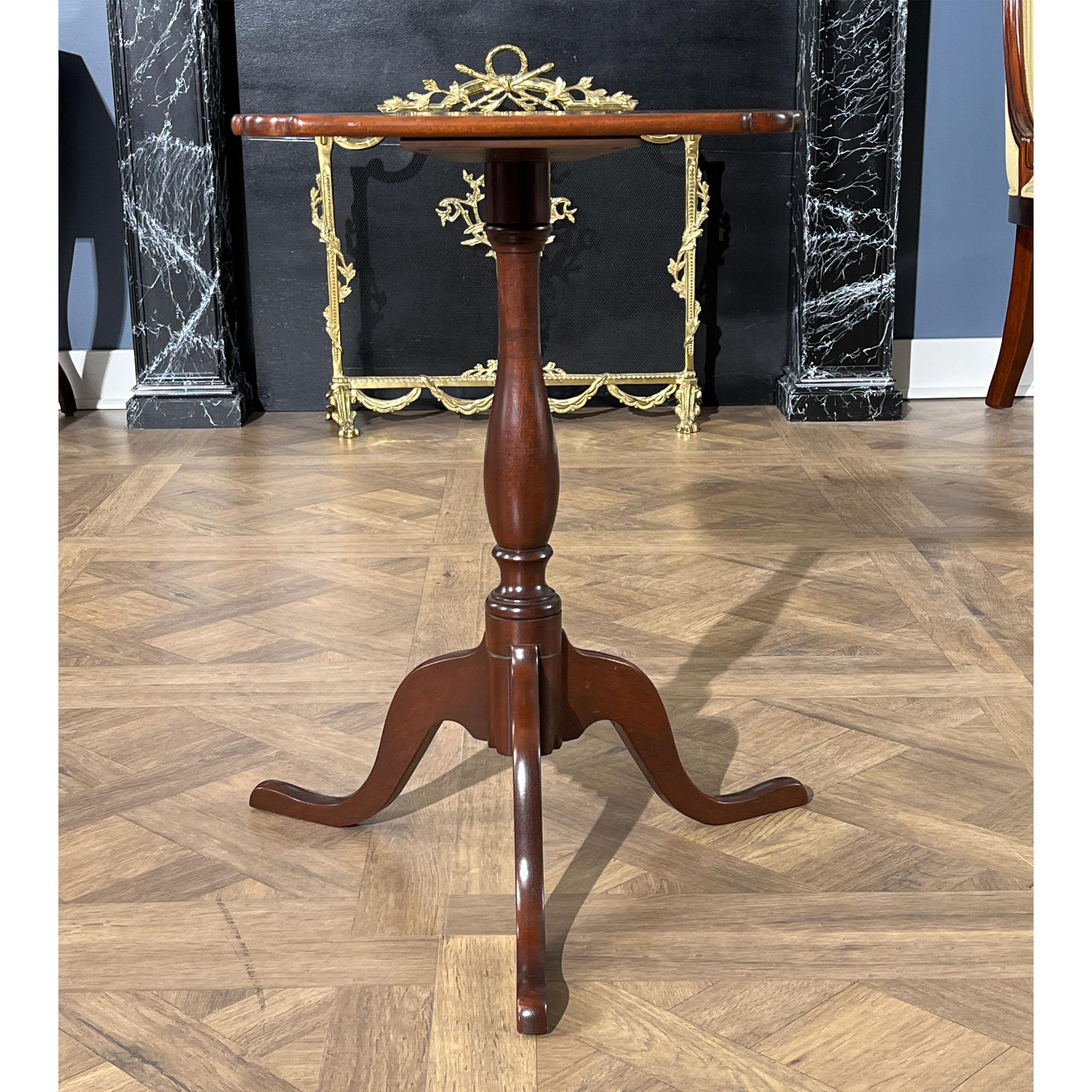 From Niagara Furniture a Vintage Small Mahogany Table. While petite and elegant this faithful antique reproduction produced by the Henry Ford Museum in Dearborn Michigan is also sturdy and strong. Great quality construction is the hall mark of the