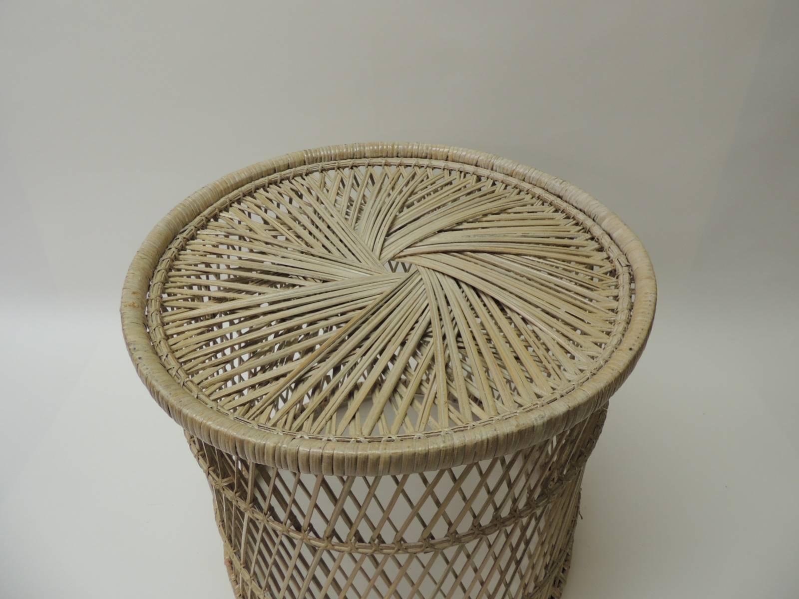 Vintage small round rattan side table
Rattan vintage small round side table with intricate woven design different in the top and the sides.
Size: 14 D x 14” H.
Design Tips: If place upside down, they make great planters, magazine holders or waste