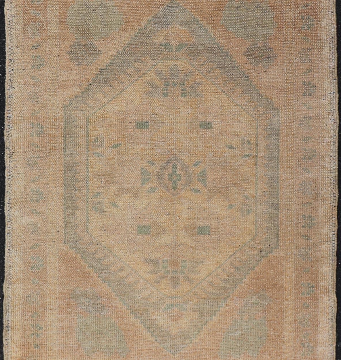 20th Century Vintage Small Turkish Oushak Rug with Medallion Design For Sale