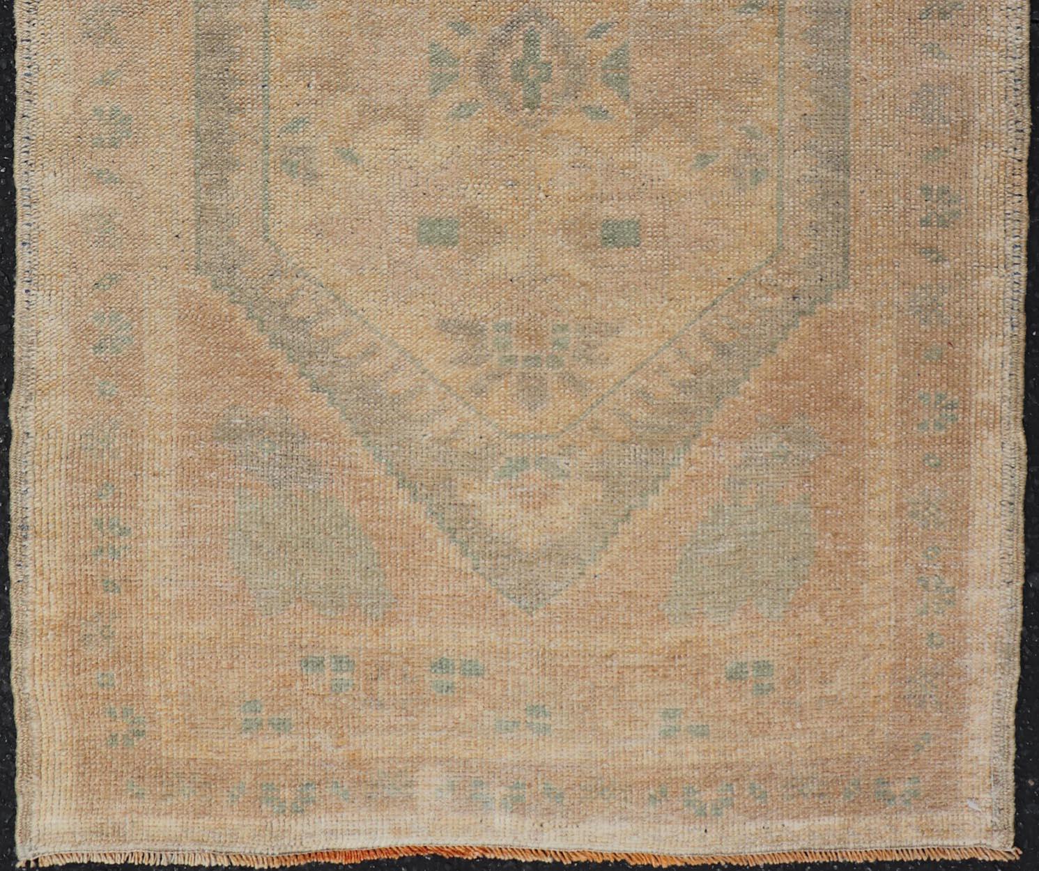 Wool Vintage Small Turkish Oushak Rug with Medallion Design For Sale
