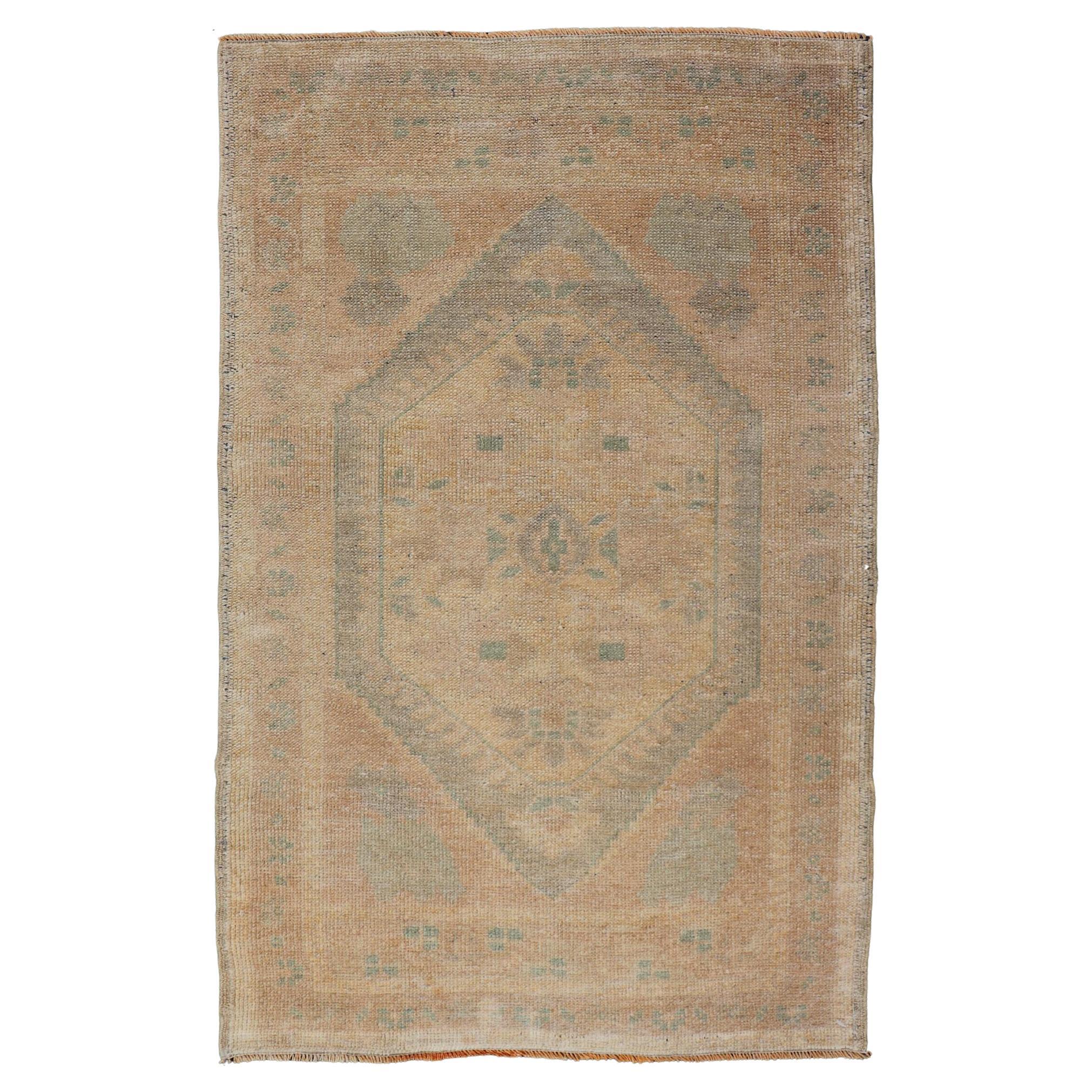 Vintage Small Turkish Oushak Rug with Medallion Design For Sale