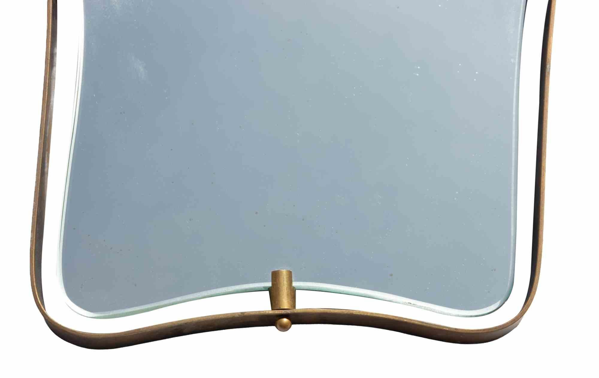 Vintage small wall mirror by Fontana Arte, realized in 1950s.

Brass structure.

Very good condition.