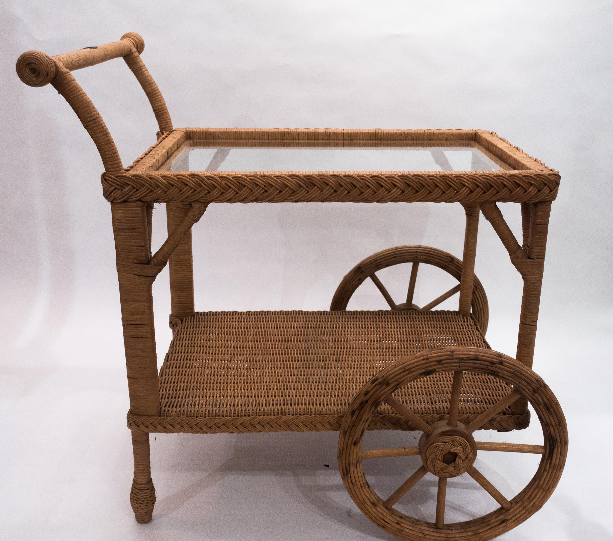 An absolutely beautiful, intricately handwoven wicker tea cart. An authentic piece designed for 