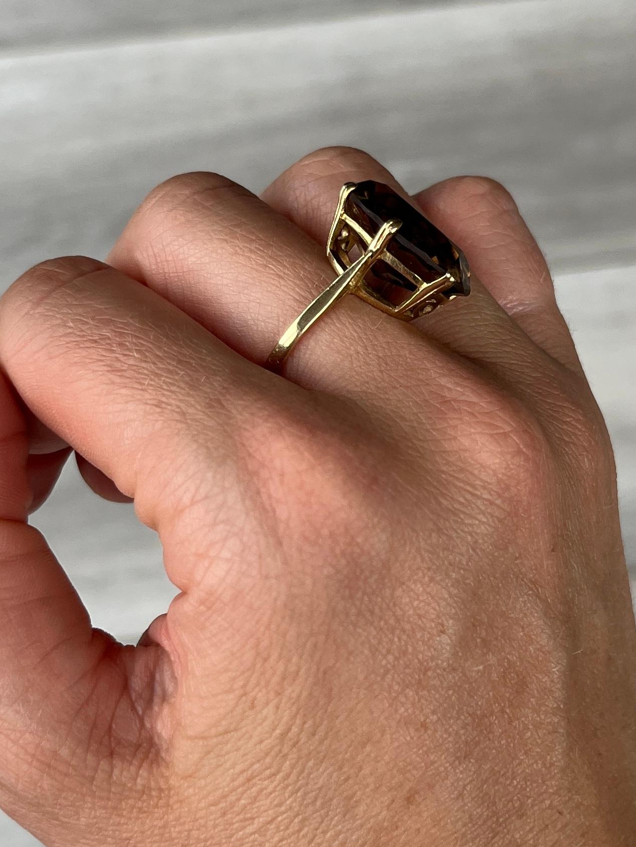 This Smokey Quartz stone is held in six simple claws and the gallery is simple. Modelled in 9carat gold. Fully hallmarked London 1968.

Ring Size: M or 6 1/4 
Height Off Finger: 11mm
Stone Dimensions: 20x14mm

Weight: 5.8g