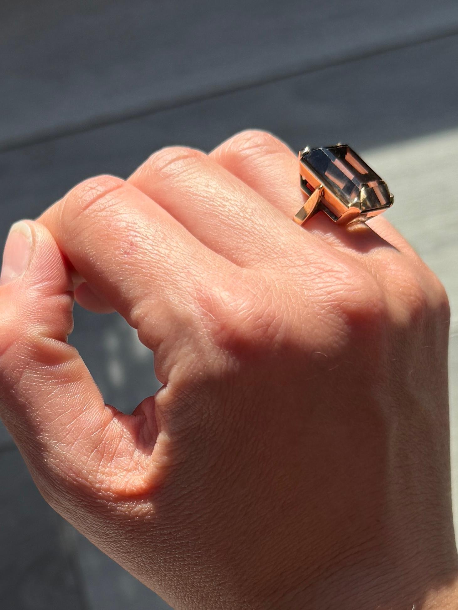The smokey quartz stone in the ring is large and gorgeous! It is deep in colour and held by simple claws. The ring is modelled in 9carat gold. 

Ring Size: I 1/2 or 4 1/2 
Stone Dimensions: 18x13mm 

Weight: 6.1g