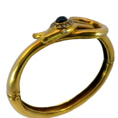 Vintage Snake Bangle Bracelet with Diamonds and Sapphire Head in 14 Karat Gold
