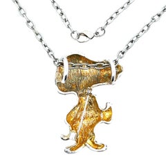 Collier vintage avec pendentif / broche Snoopy de couleur argentée