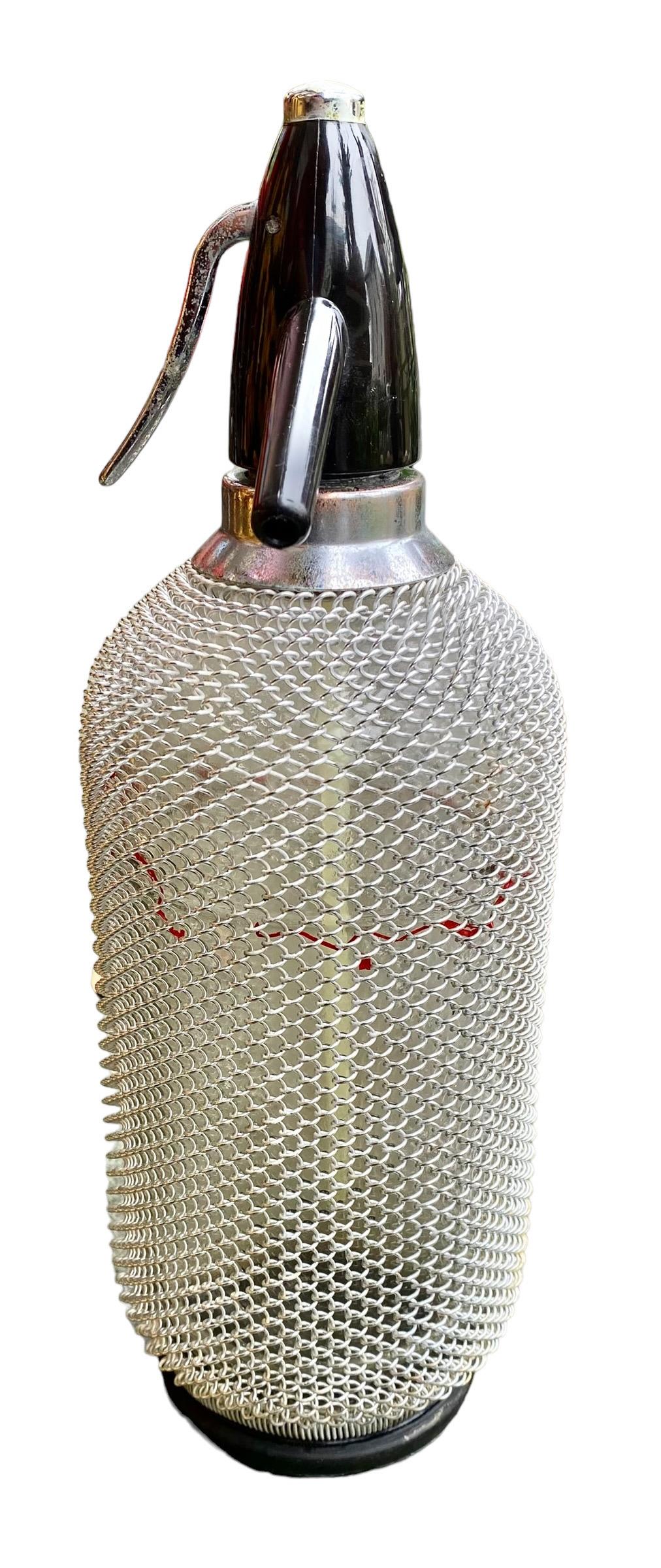 Mid-Century Modern Vintage Soda Siphon Seltzer Glass Bottle with Metal Mesh  For Sale