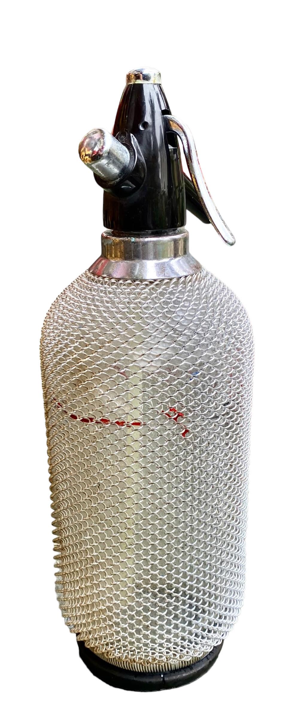 Machine-Made Vintage Soda Siphon Seltzer Glass Bottle with Metal Mesh  For Sale