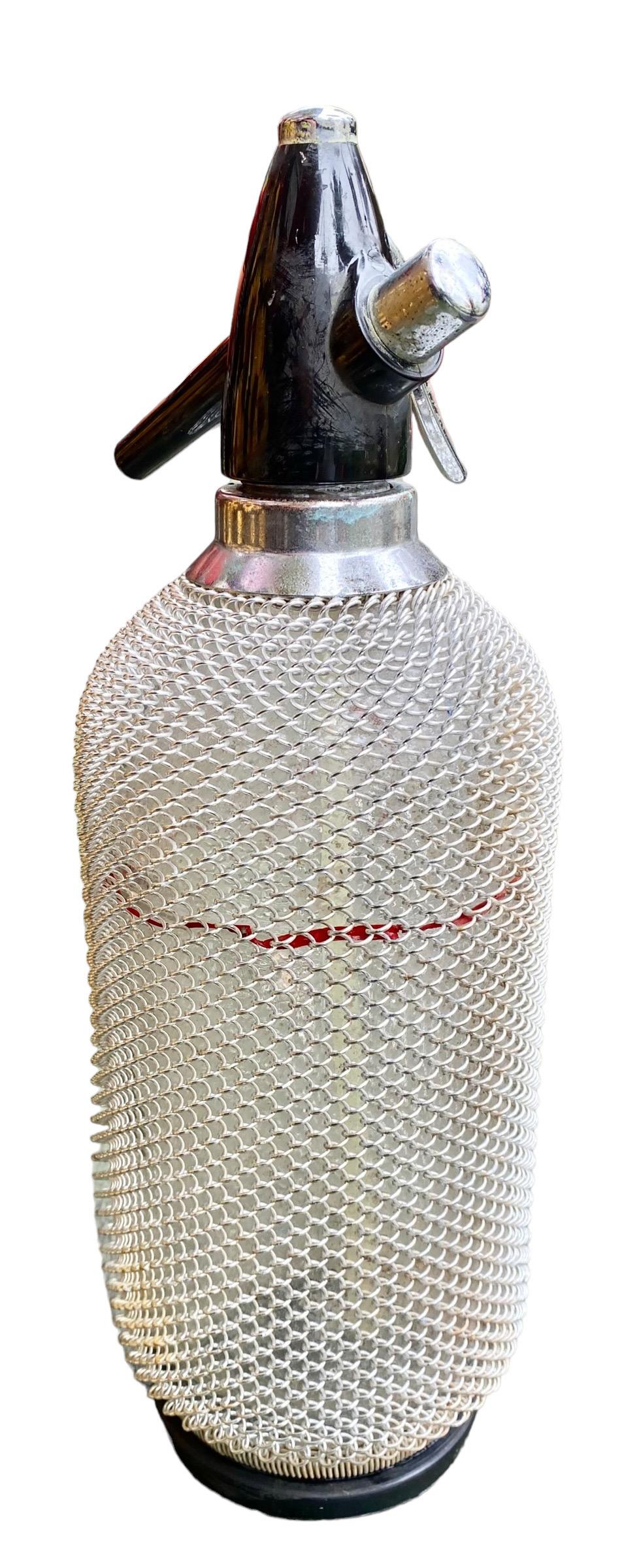 Vintage Soda Siphon Seltzer Glass Bottle with Metal Mesh  In Good Condition For Sale In New Orleans, LA