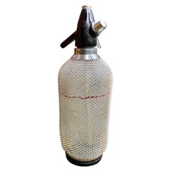 Used Soda Siphon Seltzer Glass Bottle with Metal Mesh 