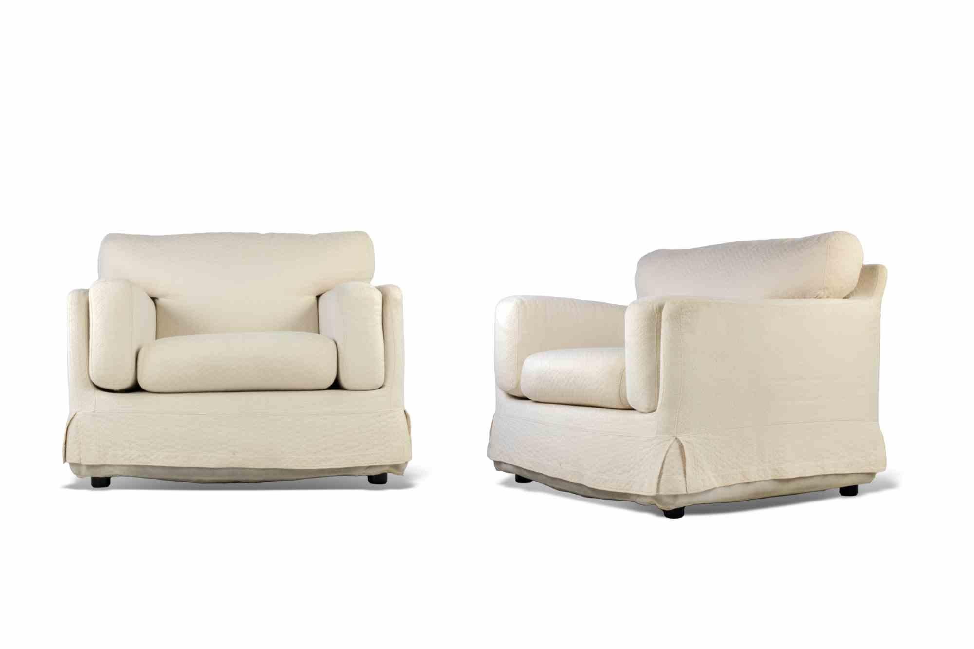 Vintage Sofa and armchair set is a 70s set.

White original fabric. 

Dimensions: Sof, 220 L x 80 H x 90 D cm; Armchair L 102 x H 80 x 93 D cm.

Good conditions, slight yellowing of the fabric, due to time.      


