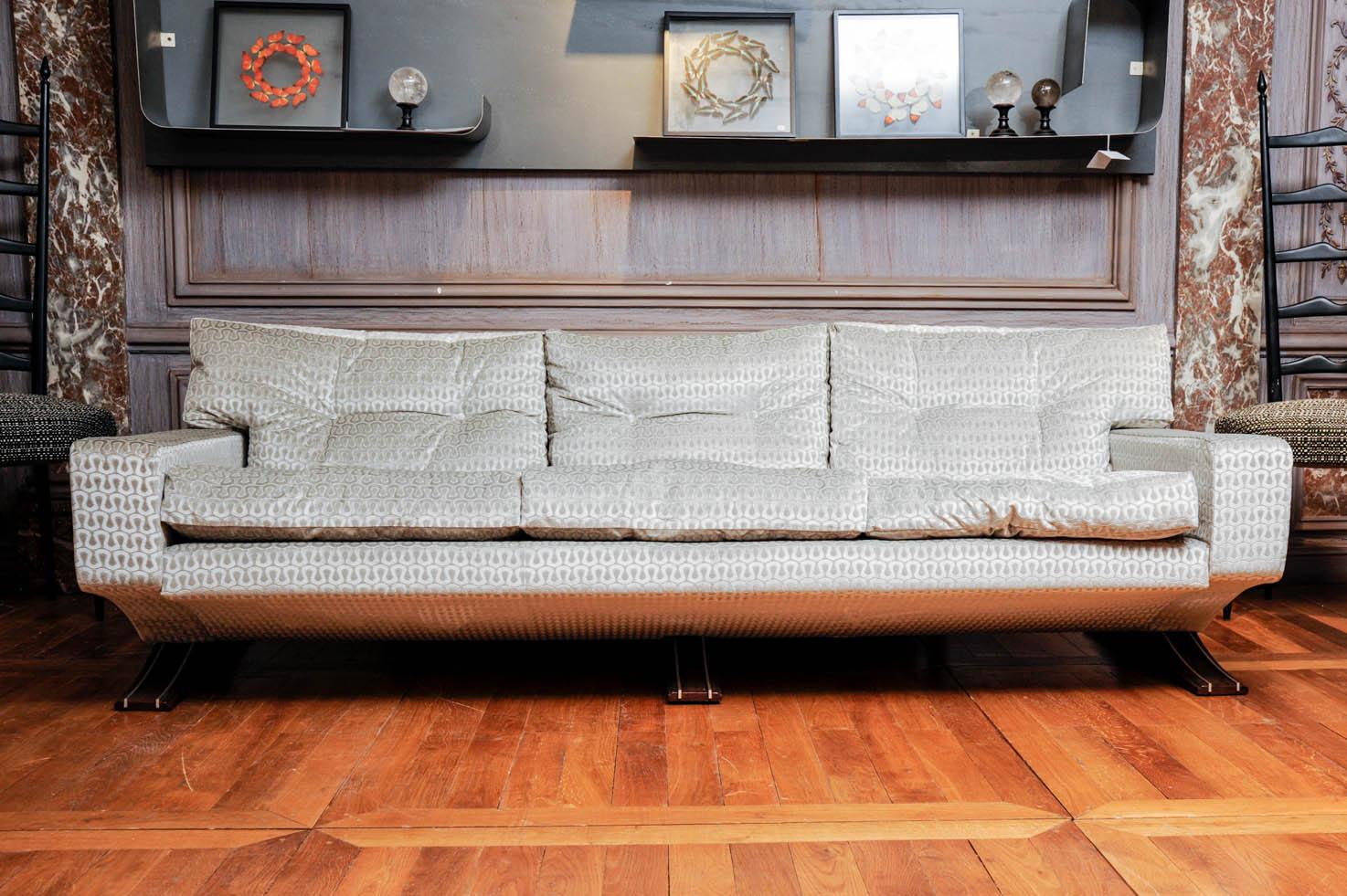 Three places vintage sofa, restored and upholstered with Gucci fabric. Feet made of wood and steel. 