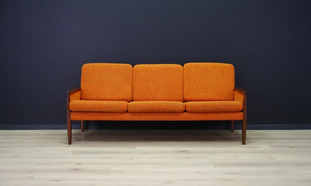 Fantastic sofa from the 1980s, Scandinavian design, original upholstery (color-orange), mahogany legs and backrest. Preserved in good general condition (small dings and scratches on wooden structure) - directly for use.

Dimensions: height 73 cm