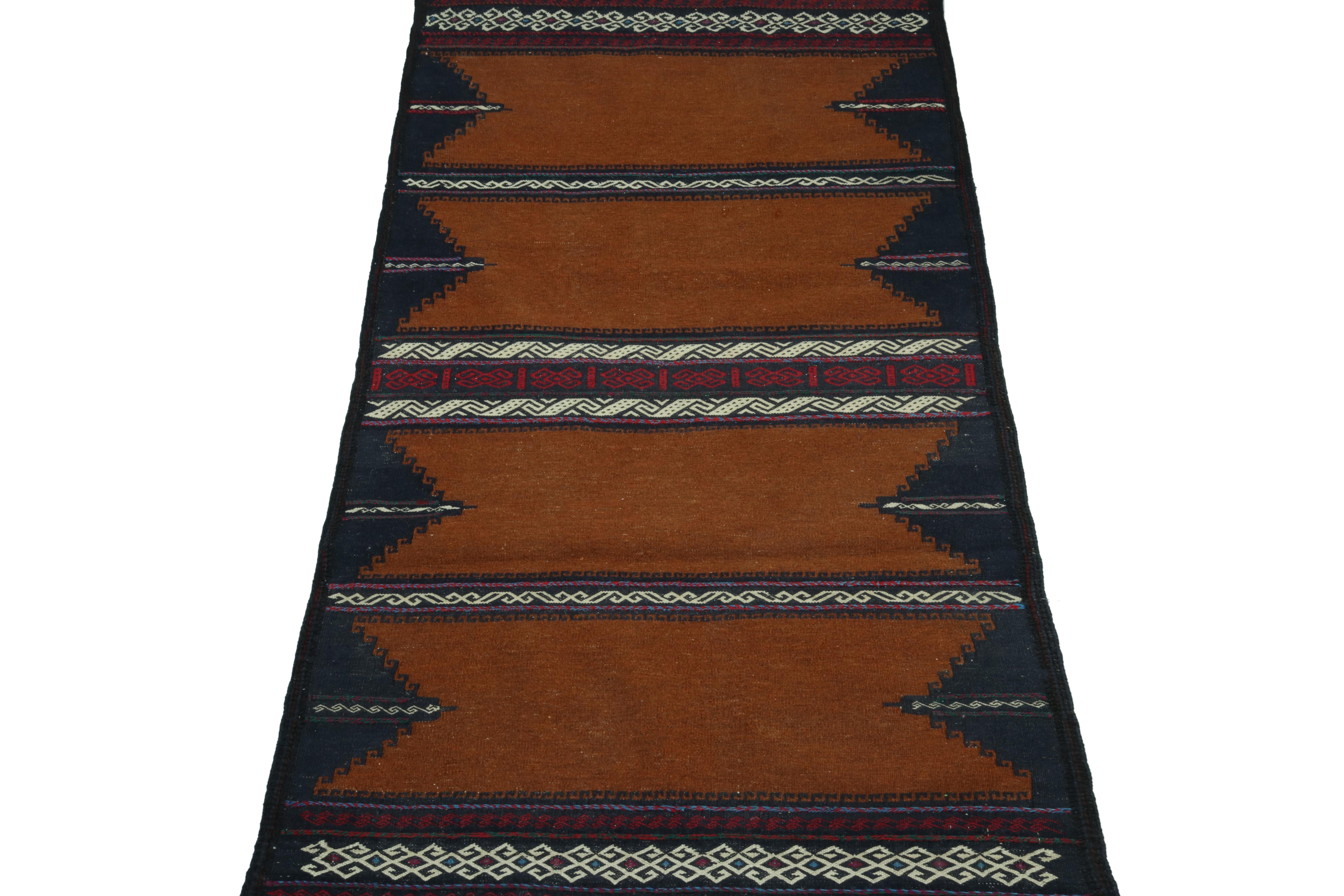 This vintage 3x4 Persian Kilim is a tribal rug of Sofreh provenance—handwoven in wool circa 1970-1980.

Further on the Design:

This piece employs an open field style in rich chocolate brown and rust colors, as well as vibrant geometric patterns