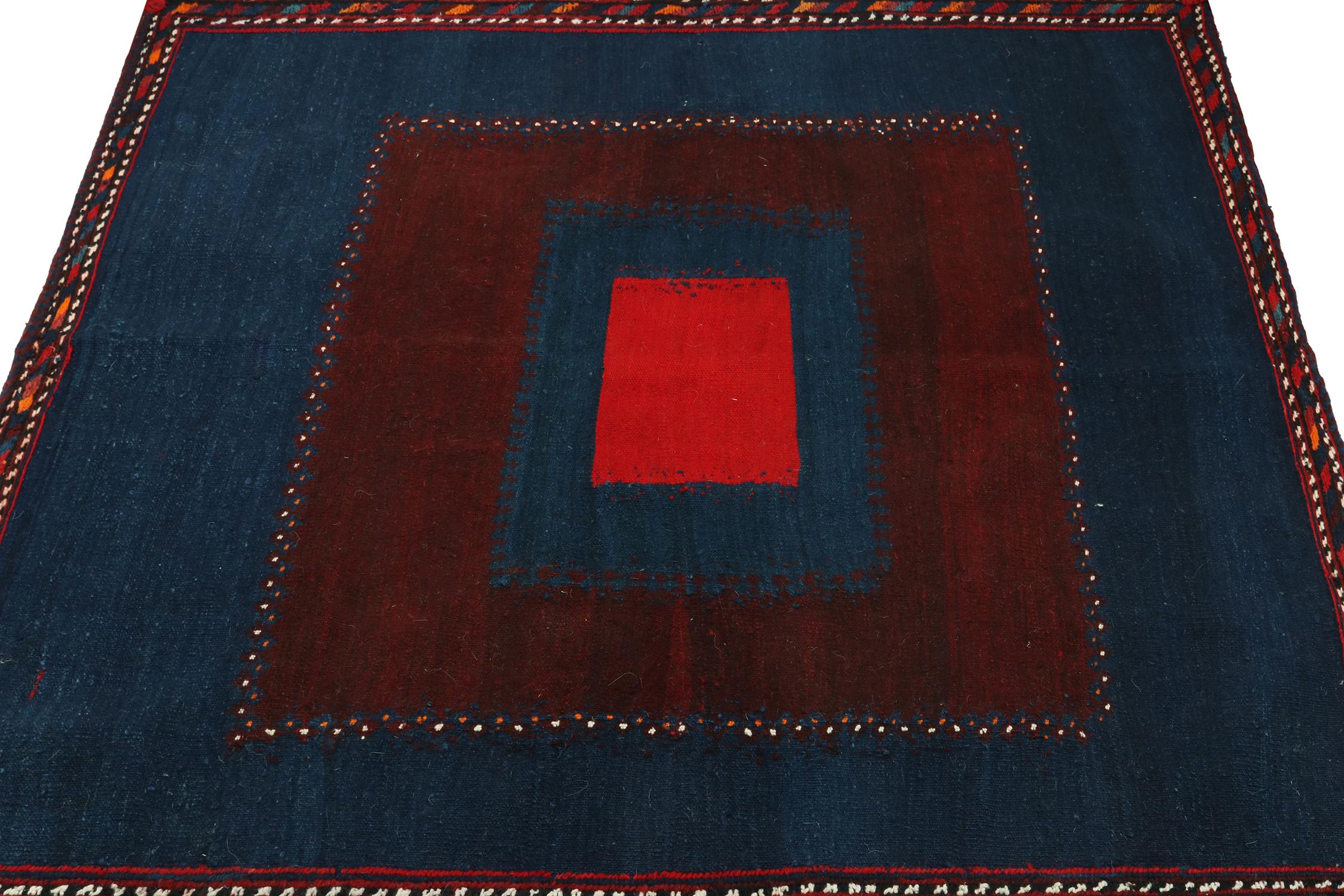 Tribal Vintage Sofreh Persian Kilim rug in Blue with Red Medallion - by Rug & Kilim For Sale