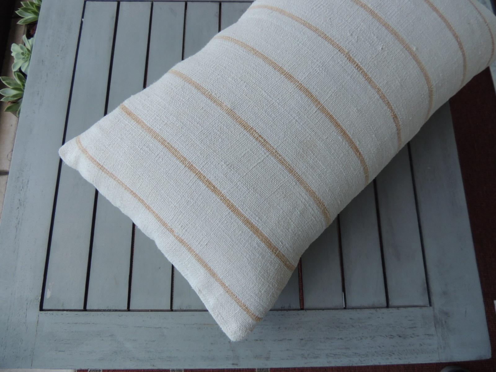 Vintage soft yellow stripes grain sack linen decorative lumbar pillow
with natural cotton backing.
Decorative pillow handcrafted and designed in the USA. 
Closure by stitch (no zipper closure) with custom made pillow insert.
Size: 11