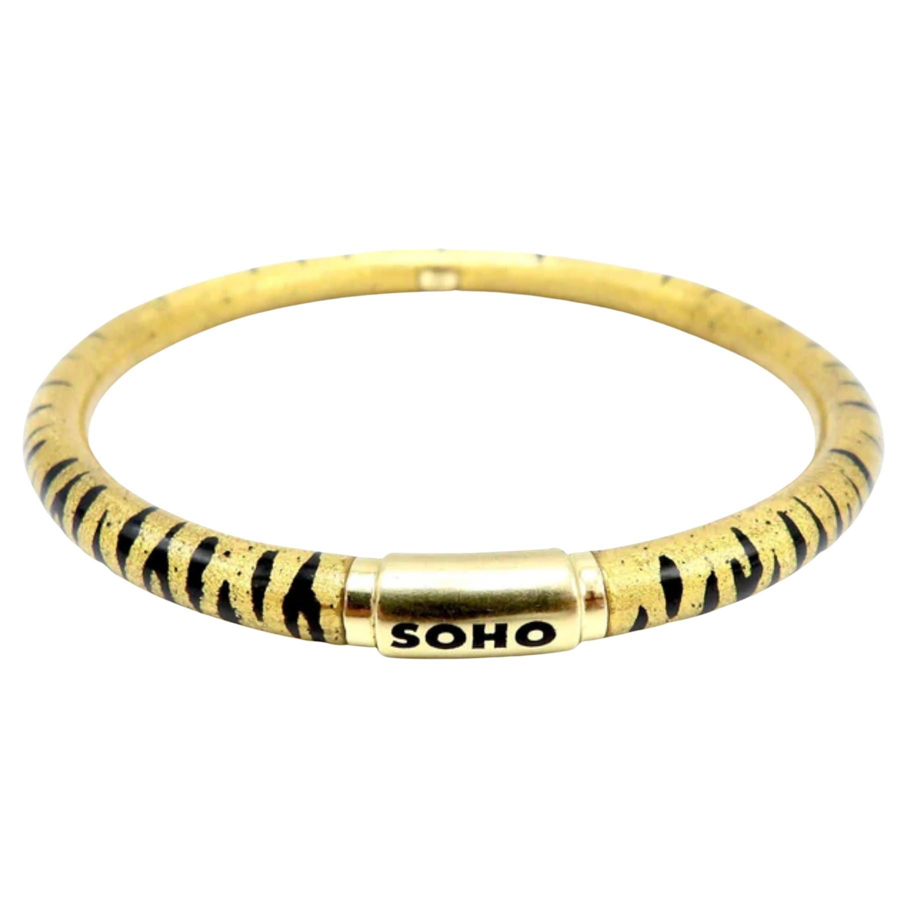 Soho 18K Gold Enamel Tiger Stripe Bangle Bracelet, circa 2010 For Sale