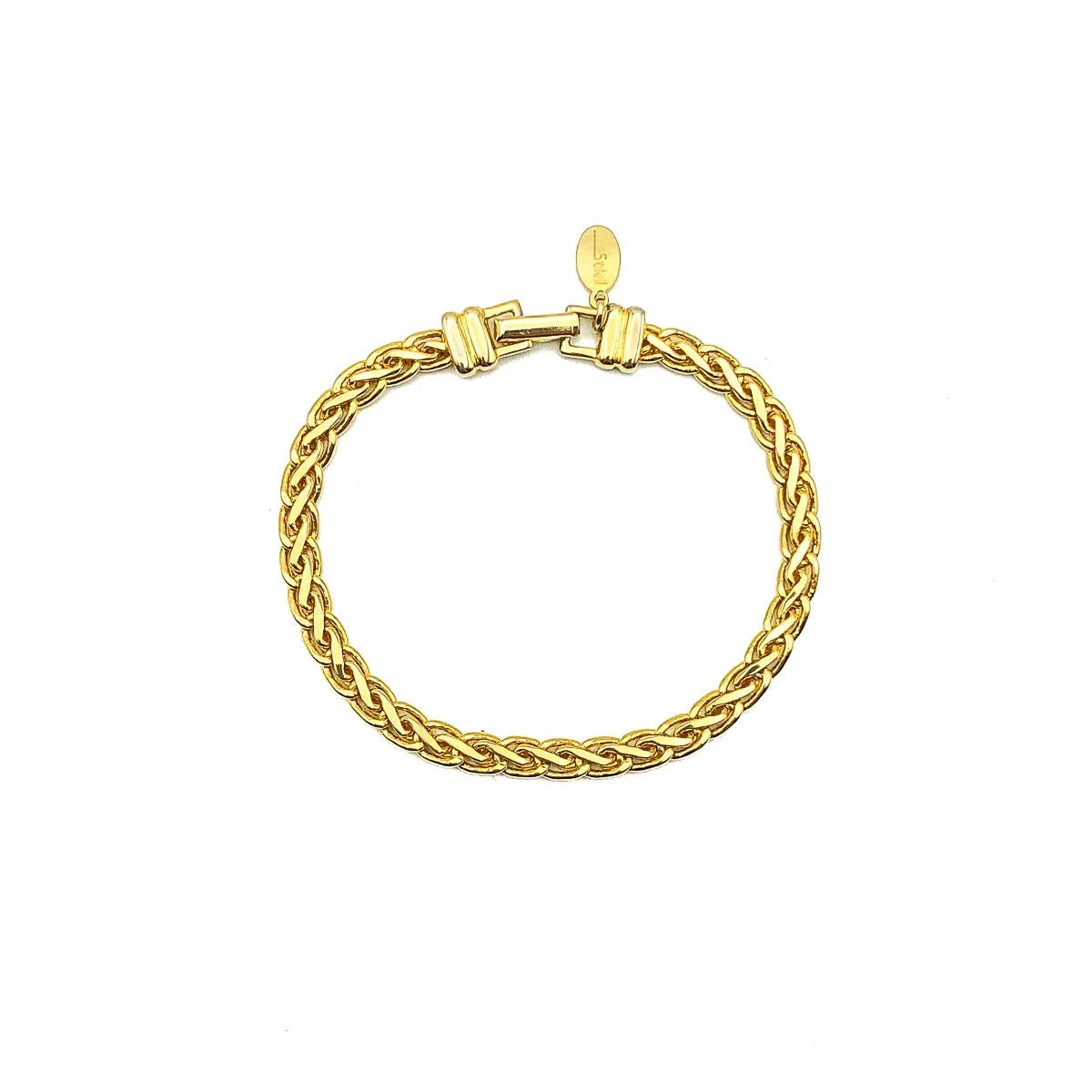 Vintage Soleil Chain Bracelet. Crafted in gold plated metal. Very good vintage condition, signed, 18cms. A perfect style staple. 

Established in 2016, this is a British brand that is already making a name for itself in the jewellery world both at