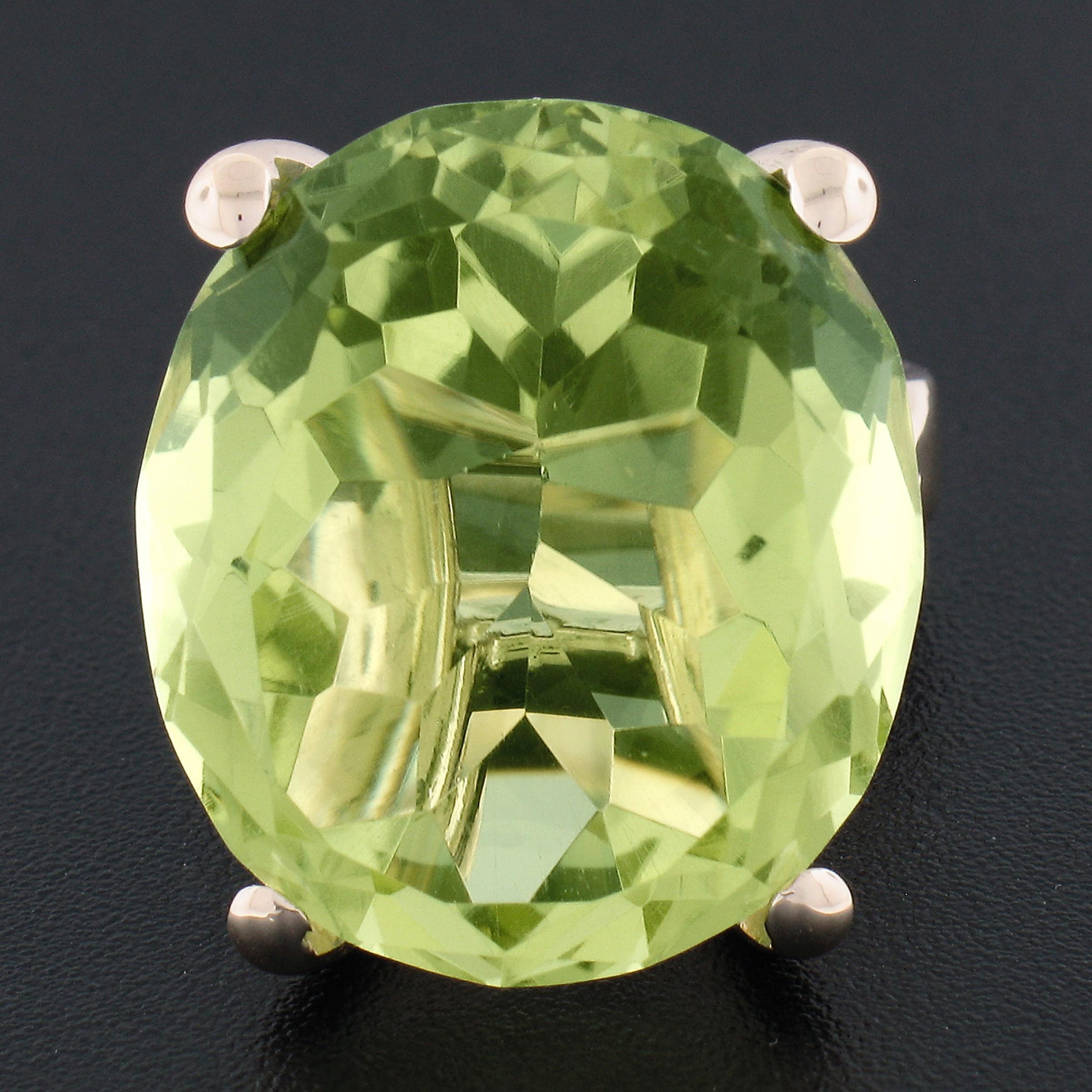 --Stone(s):--
(1) Natural Genuine Lemon Quartz - Oval Cut - Prong Set - Yellowish Green Color - 21.5x18.6mm (approx.)

Material: Solid 14K Yellow Gold
Weight: 10.85 Grams
Ring Size: 6.5 (Fitted on a finger. We can custom size this ring - please