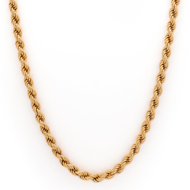 Vintage Solid 18K Yellow Gold Rope Chain c.1980s

Period: Vintage
Year: 1980s
Material: 18k Yellow Gold 
Weight: 101.35g
Length: 35 inches / 88.9cm
Width: 4.88mm 
Condition: Excellent
