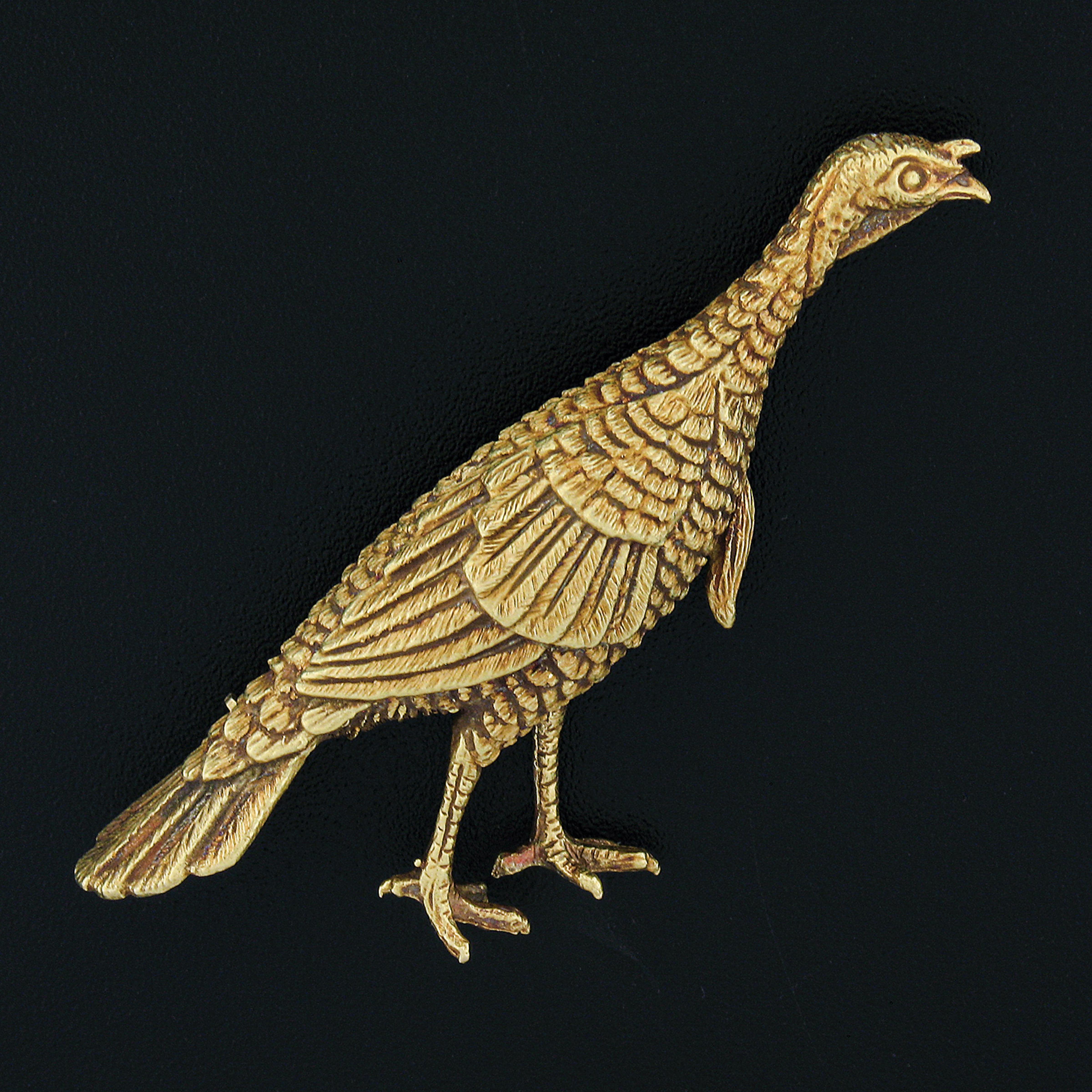 This incredible and very well made vintage pin brooch is crafted in solid 18k yellow gold. It features a perfectly structured 3D turkey design with remarkably outstanding workmanship and texture that bring out maximum detailing granting a truly