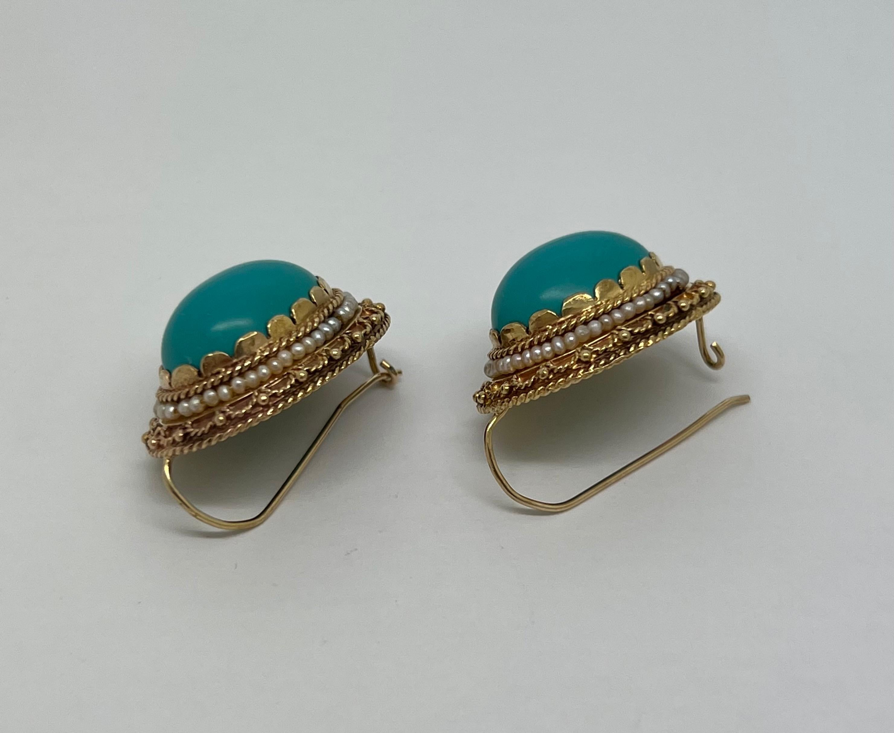 Up for sale:

These absolutely beautiful Solid 18K Yellow Gold Turquoise Drop Earrings. 
Excellent workmanship
Length: 1.05 inch
Width: 0.83 inch
Weight: 12.8
Metal: solid 18k gold
Hallmark: 18k

These earrings will be professionally cleaned and