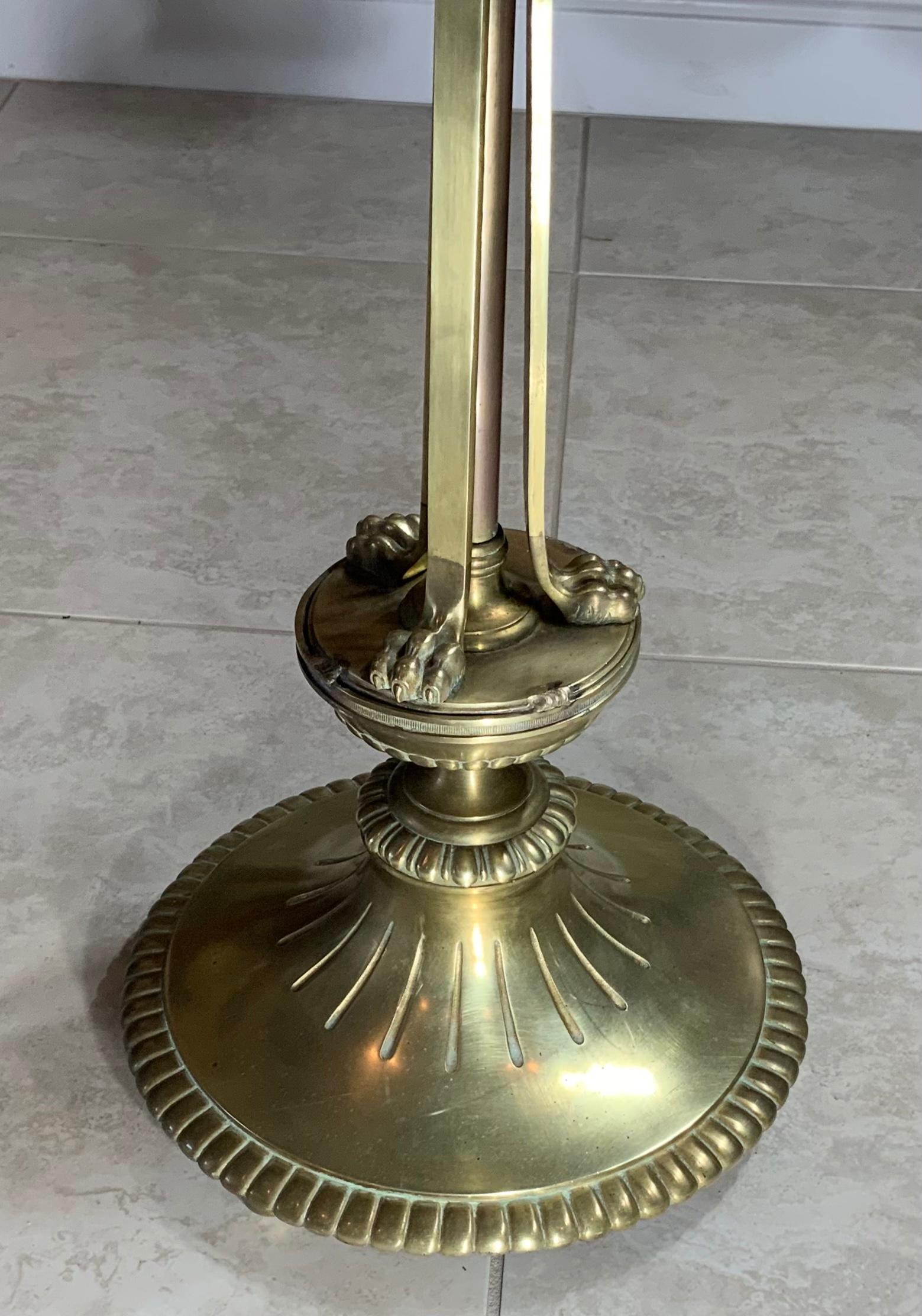 Funky table base made of solid brass with three decorative claw legs . Custom-made steel plate top, that can take marble glass, or wood top.
The brass base was originally salvaged from vintage English floor lamp / to become one of a kind table