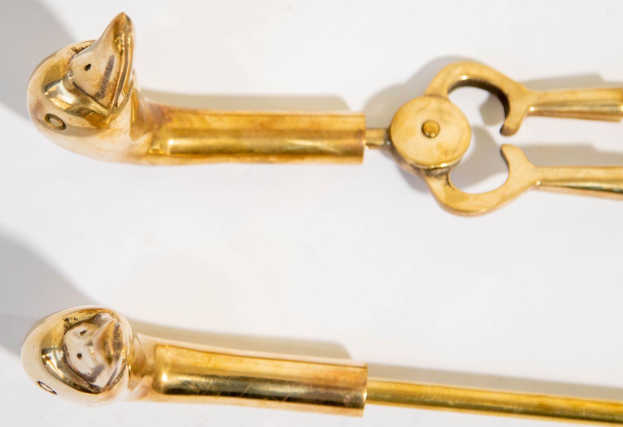 Attrezzi per caminetto in ottone massiccio vintage con teste di anatra Maison Jansen francese in vendita 8
