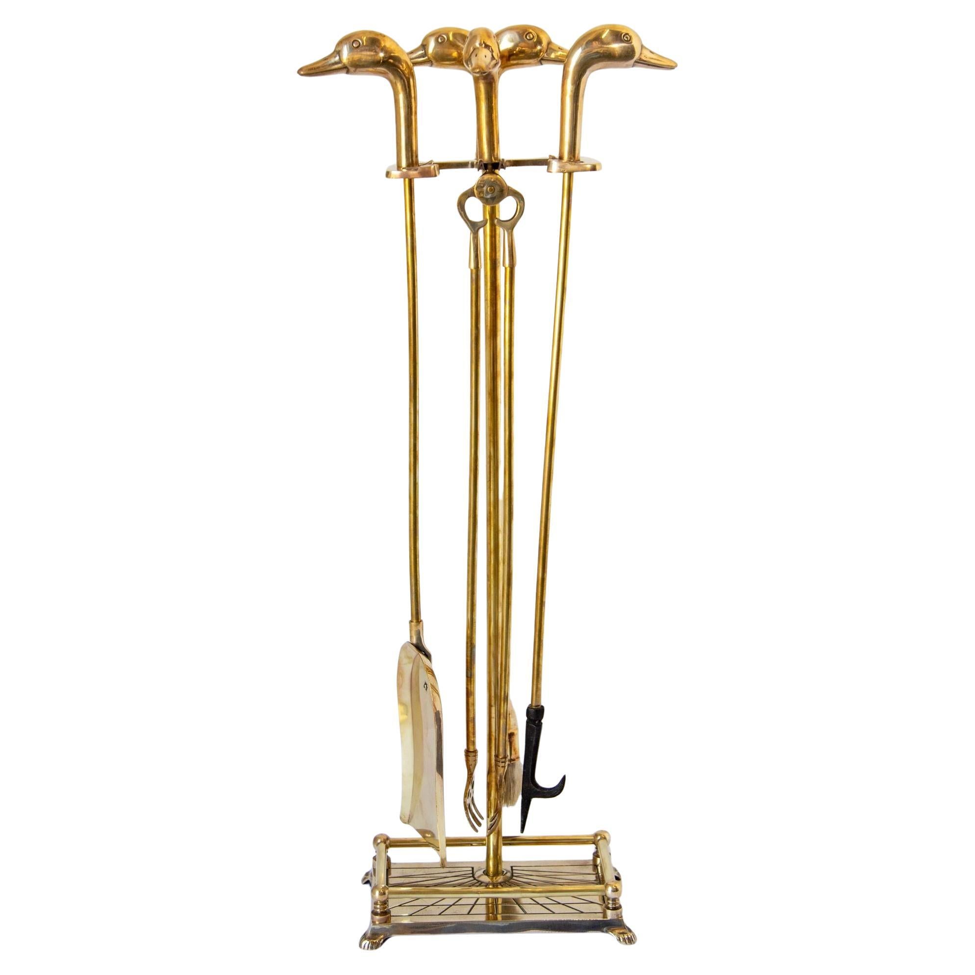 Utensilios vintage de latón macizo para chimenea con cabezas de pato Maison Jansen francesa