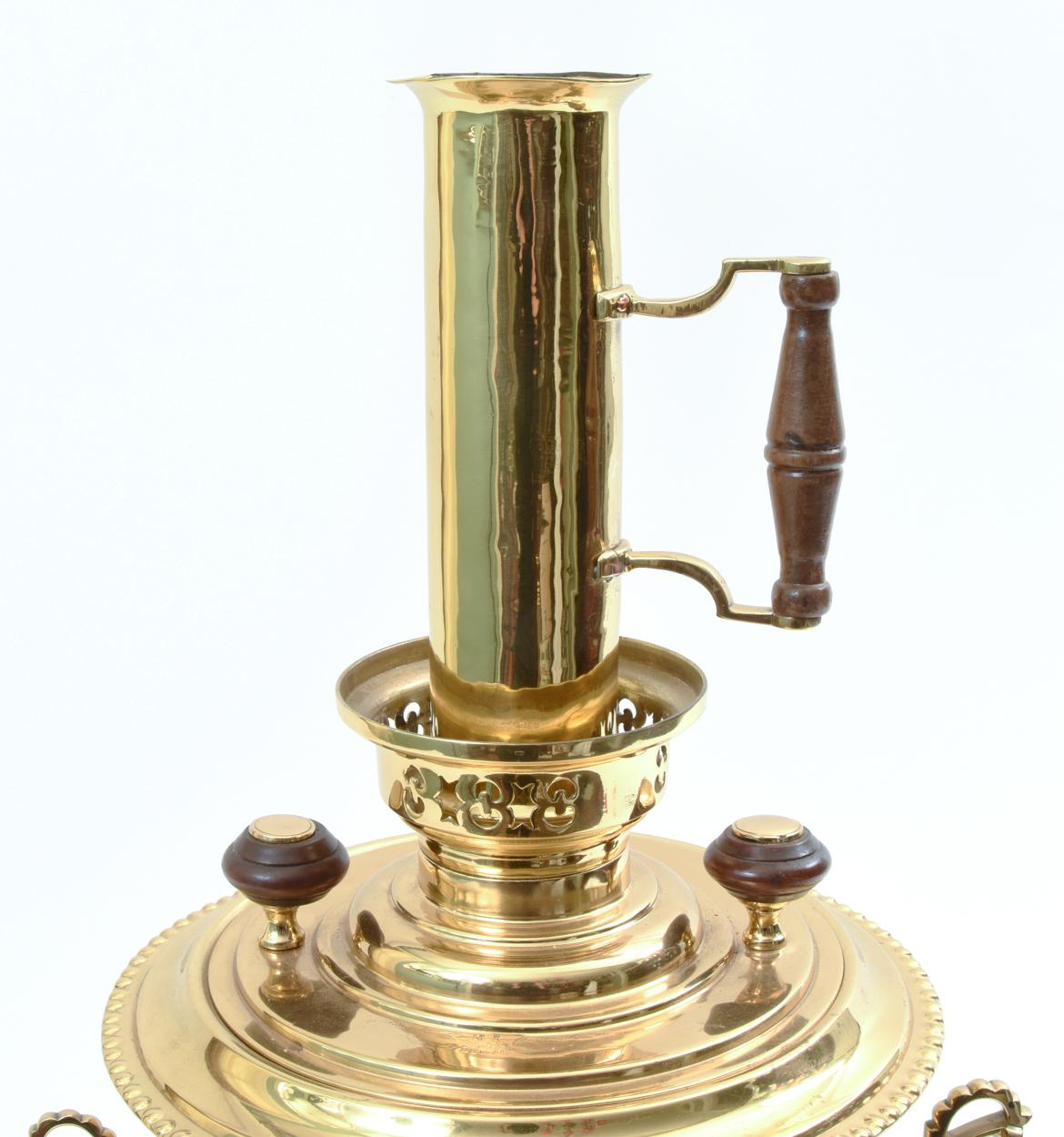 Vintage Eastern European solid brass hallmarked large coffee, tea, water boiling serving samovar with wood side handles. The serving samovar is in excellent vintage condition, minor wear consistent with use / age. The samovar measure about 26 inches