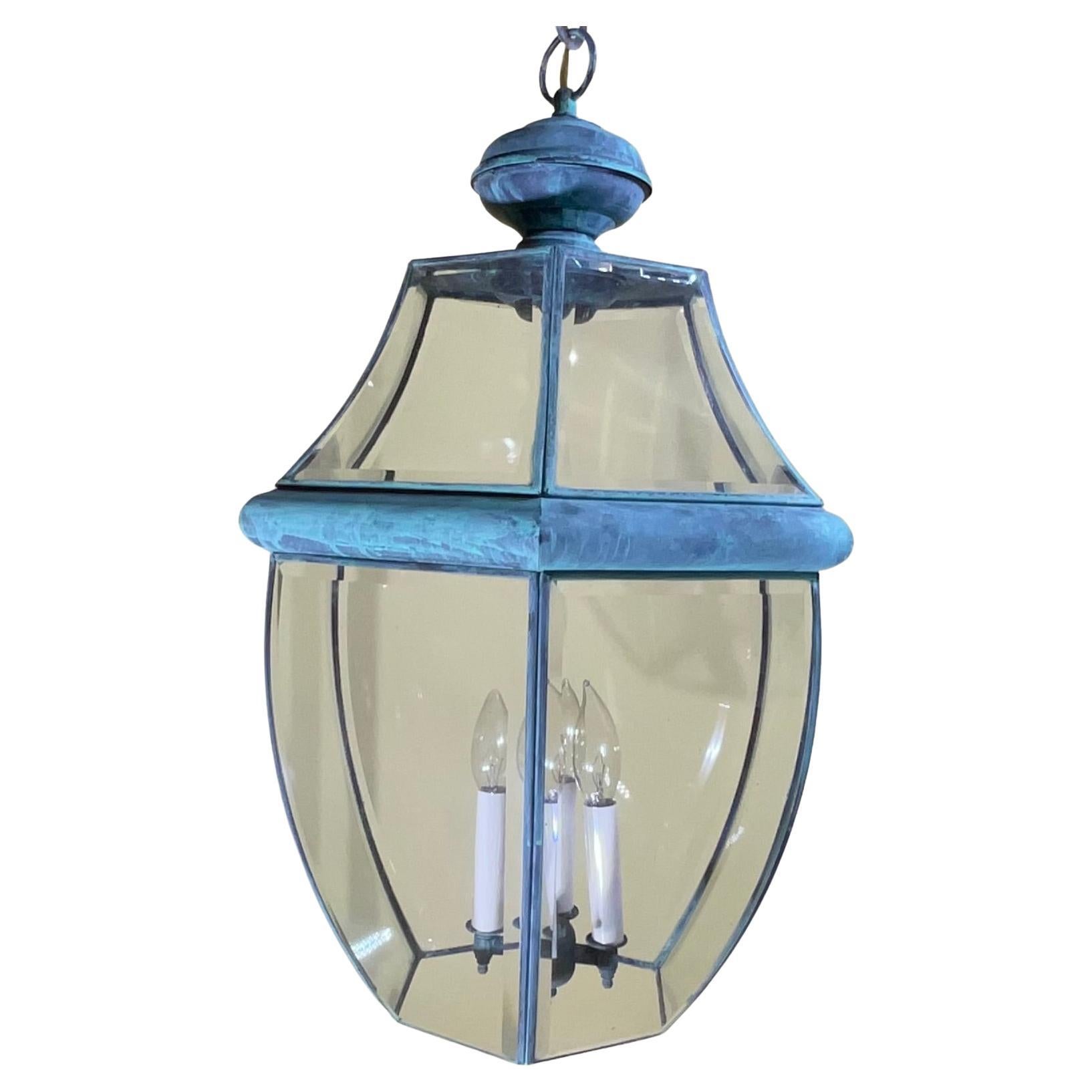  A Timeless Piece of Architectural Charm

This is an opportunity to acquire a stunning, high-quality solid brass hanging lantern with a beautiful, patina finish . Its classic, transitional shape and premium materials make it the perfect focal point