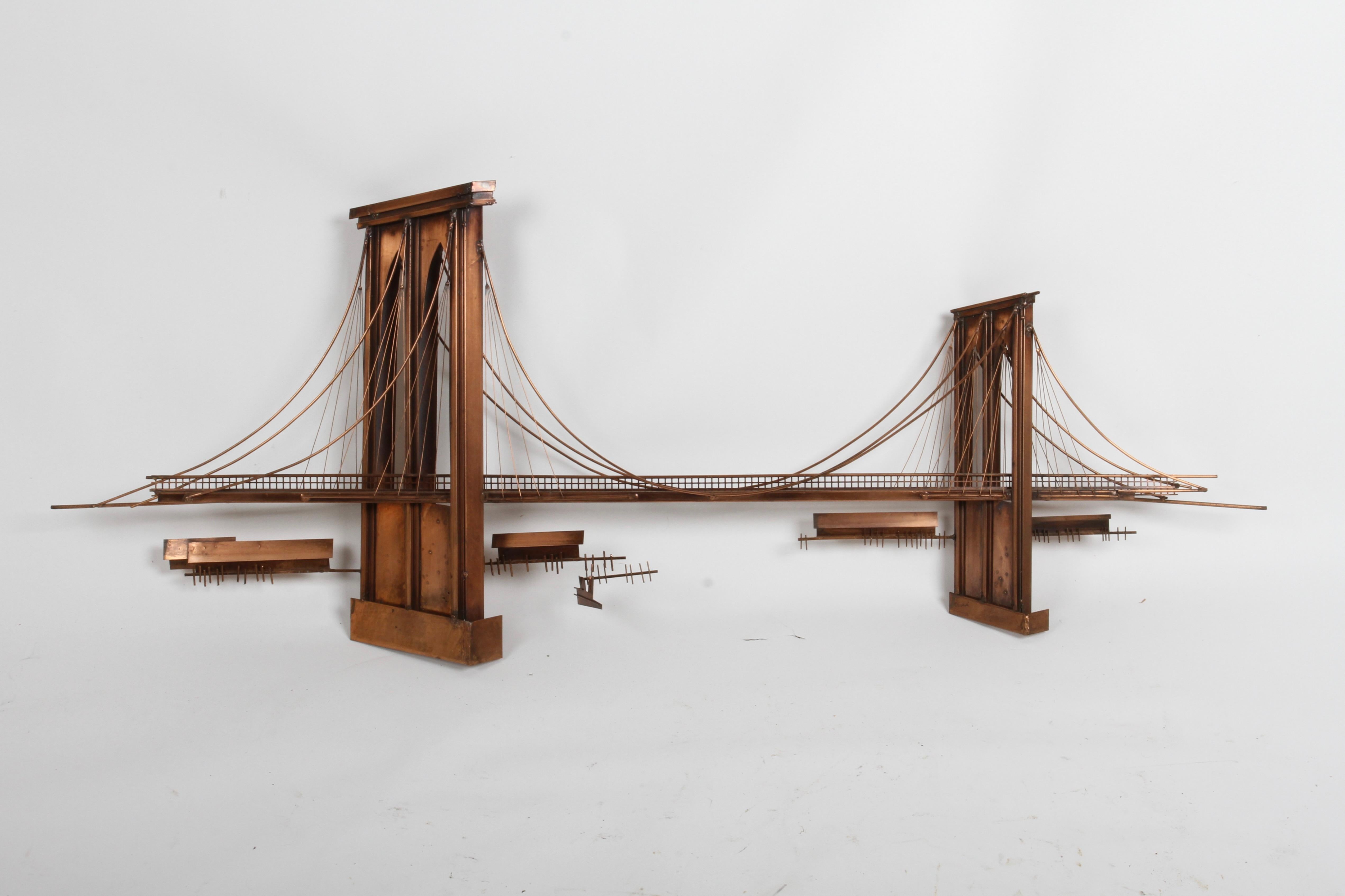 Large iconic Brooklyn Bridge brutalist wall sculpture, handmade in copper by Curtis Jeré Artisans, circa 1970s. Rarely seen in solid copper, brass plated version more common. Signed twice, once in black ink C.Jeré on the front and second on back